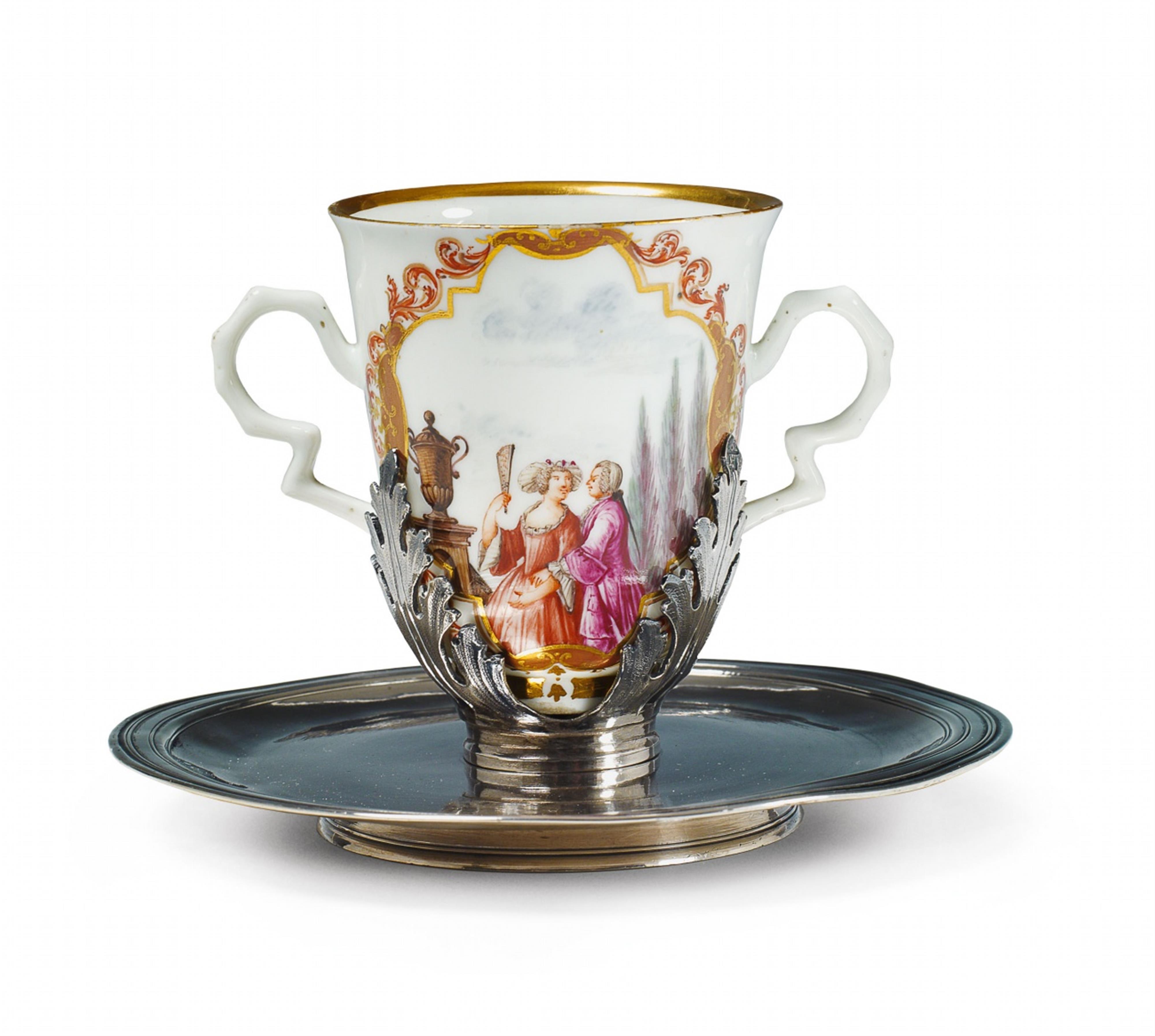 A Meissen porcelain beaker in a silver trembleuse form holder. - image-1