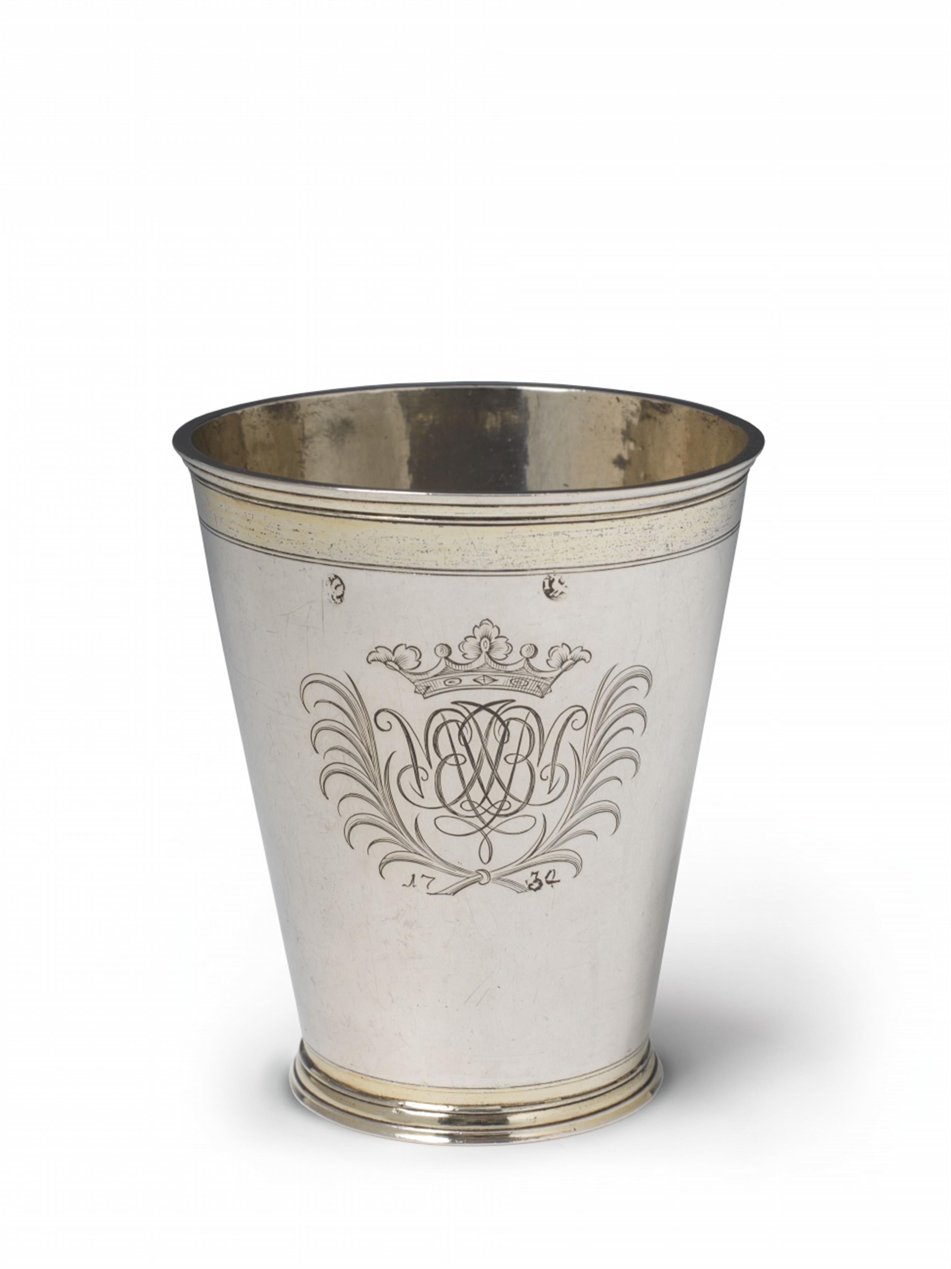 A Lübeck silver gilt wedding beaker. Monogrammed "JBM" and dated 1734, set to the underside with a medallion by Johann Buchheim (1672) on the topic of marital love. Marks of Joachim Dietz, ca. 1730. - image-1