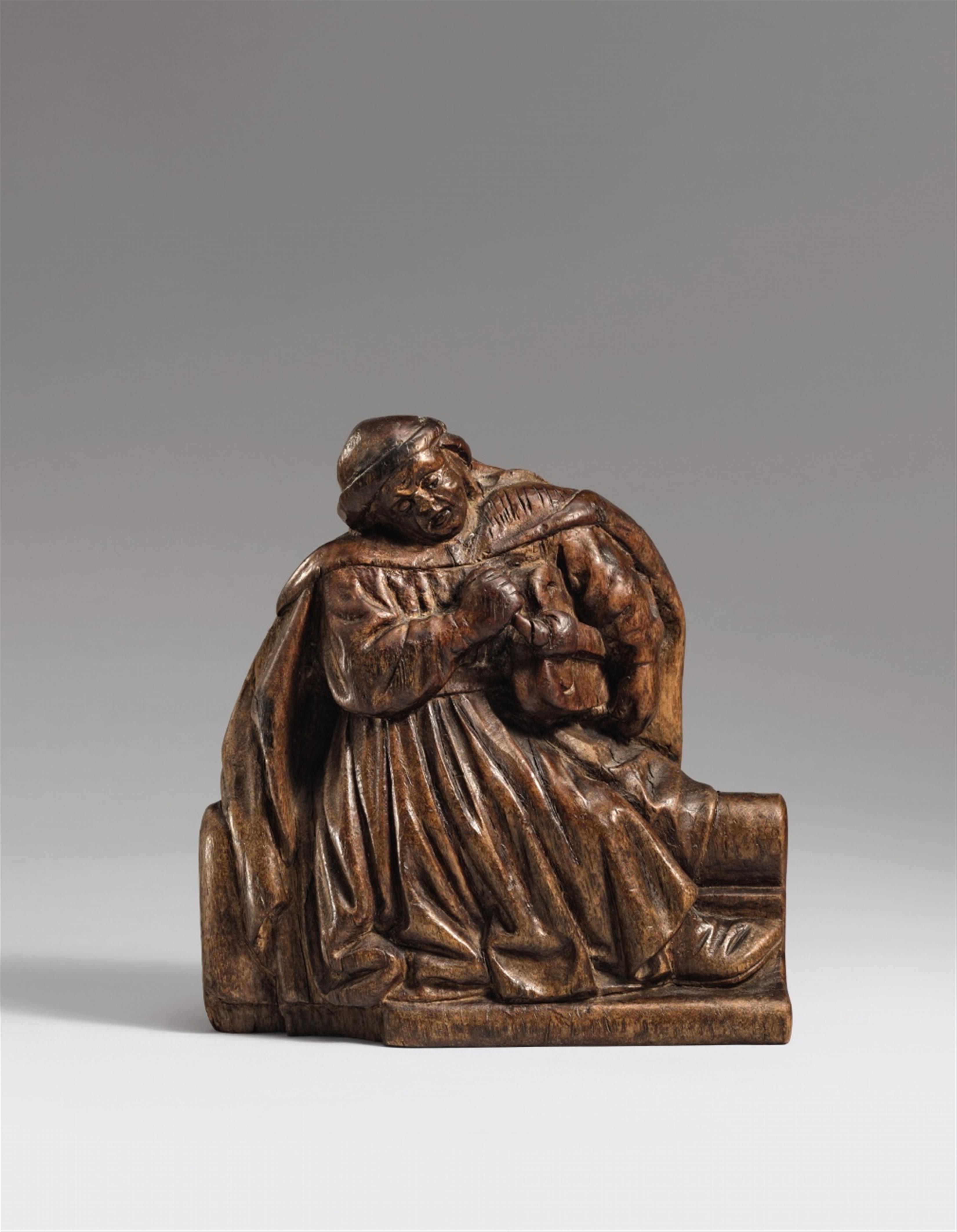 West Germany 15th century - A 15th century west German carved oak figure of a monk with a hurdy gurdy. - image-1