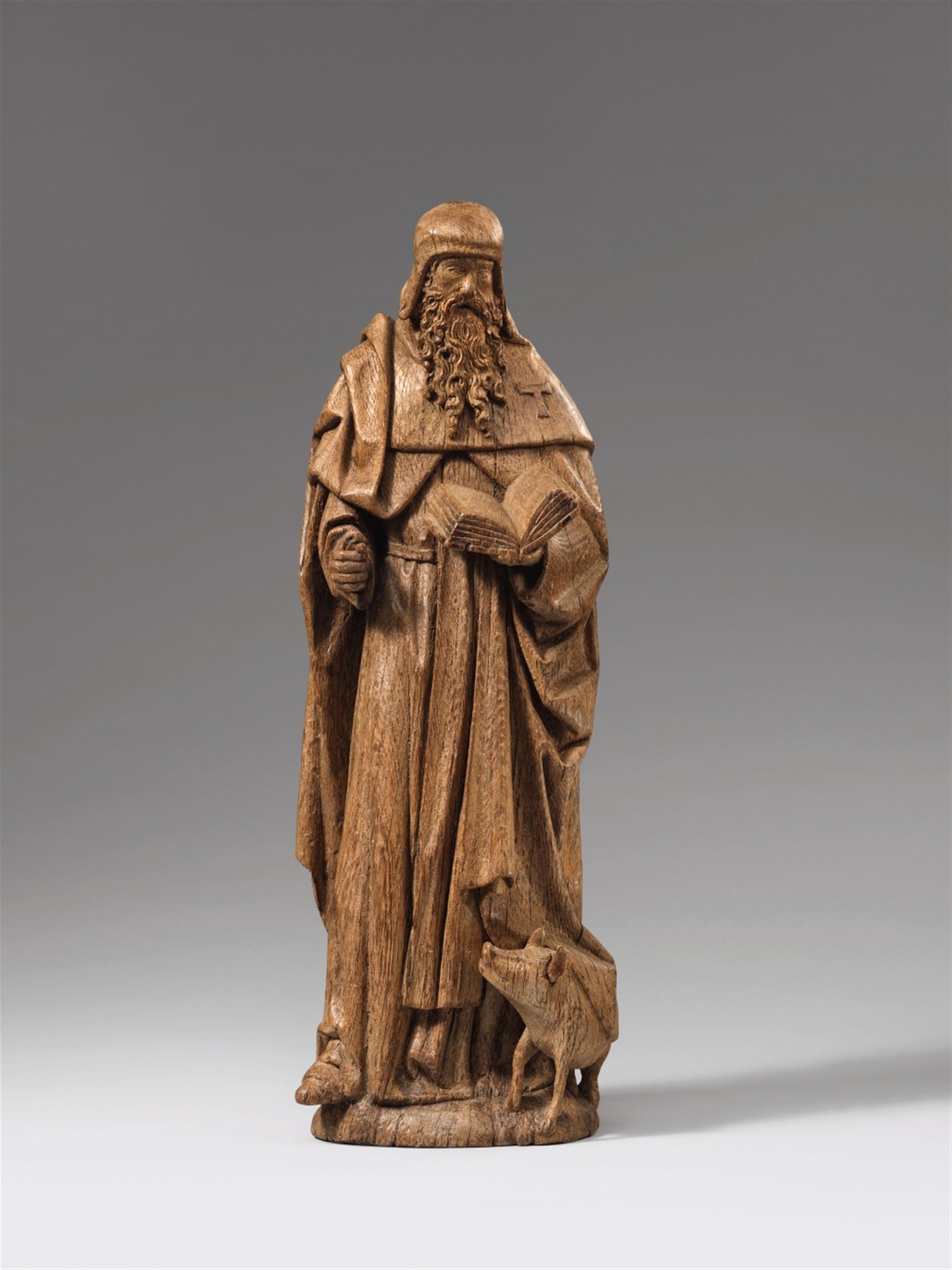 Lower Rhine Region late 15th century - A late 15th century Lower Rhenish carved oak figure of Saint Anthony. - image-1