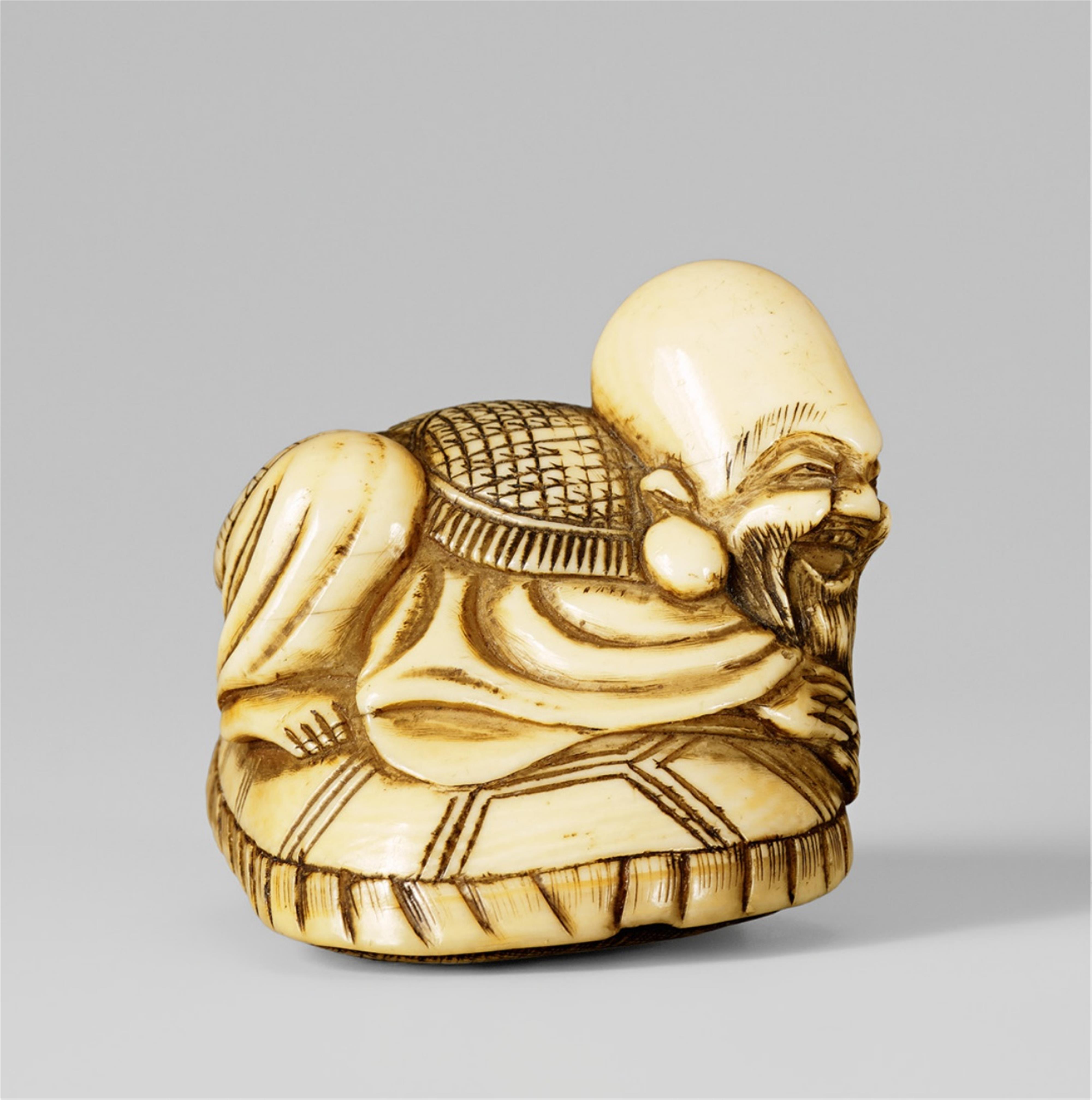 A large ivory netsuke of Fukurokuju on a tortoise. Early 19th century - image-1