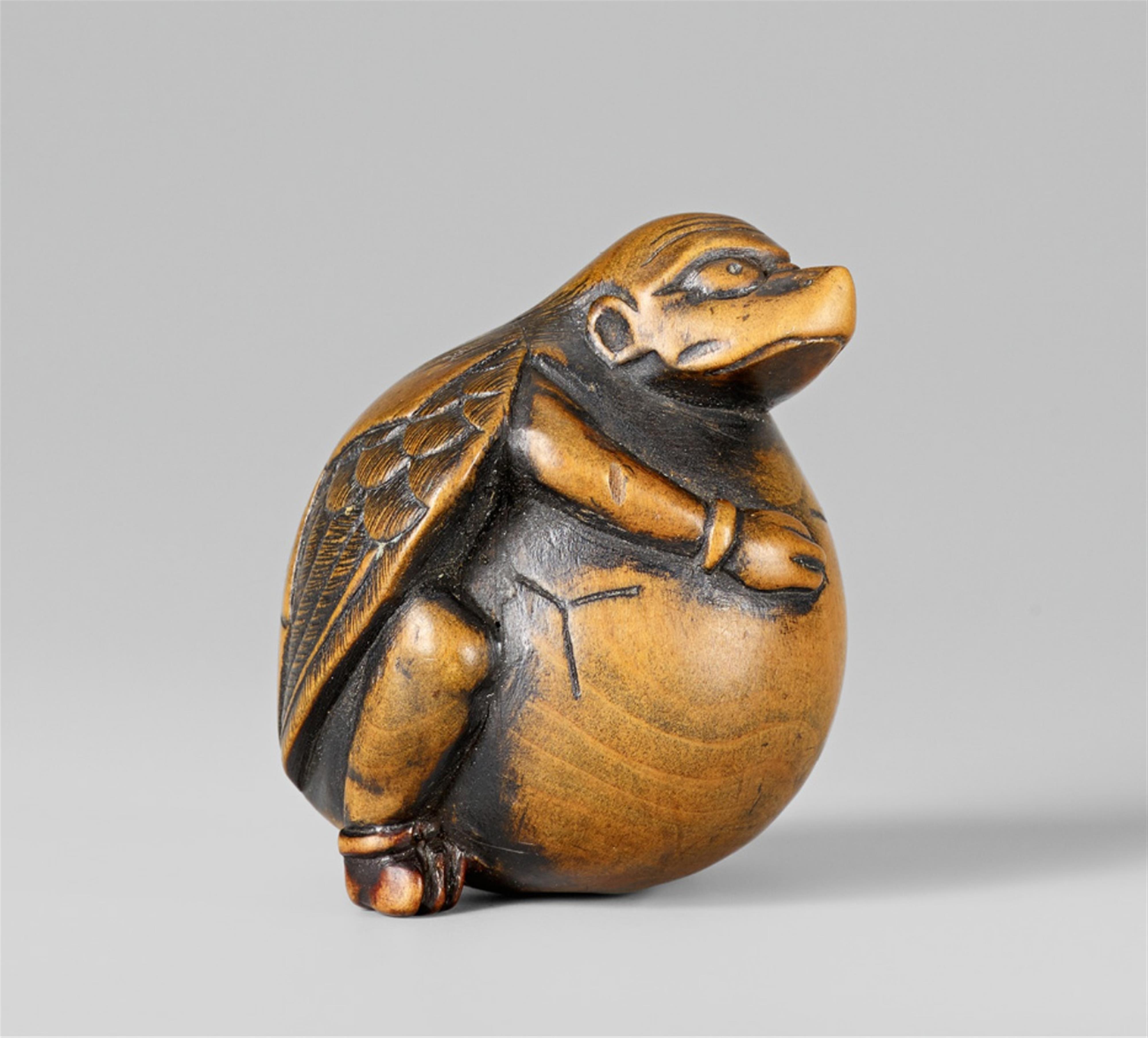 A boxwood netsuke of a tengu no tamago. Early 19th century - image-1