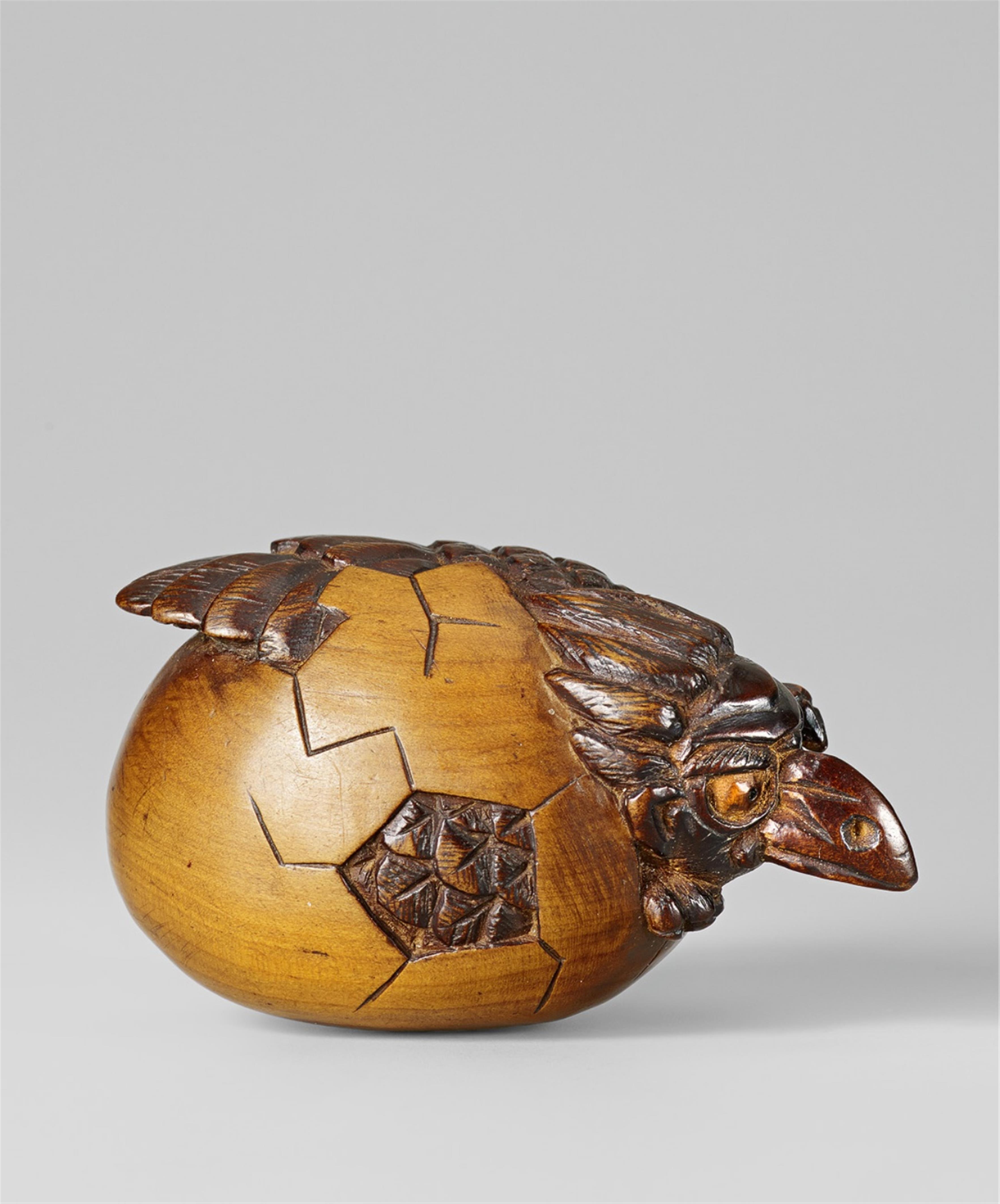 A large wood netsuke of a tengu no tamago. 19th century - image-1