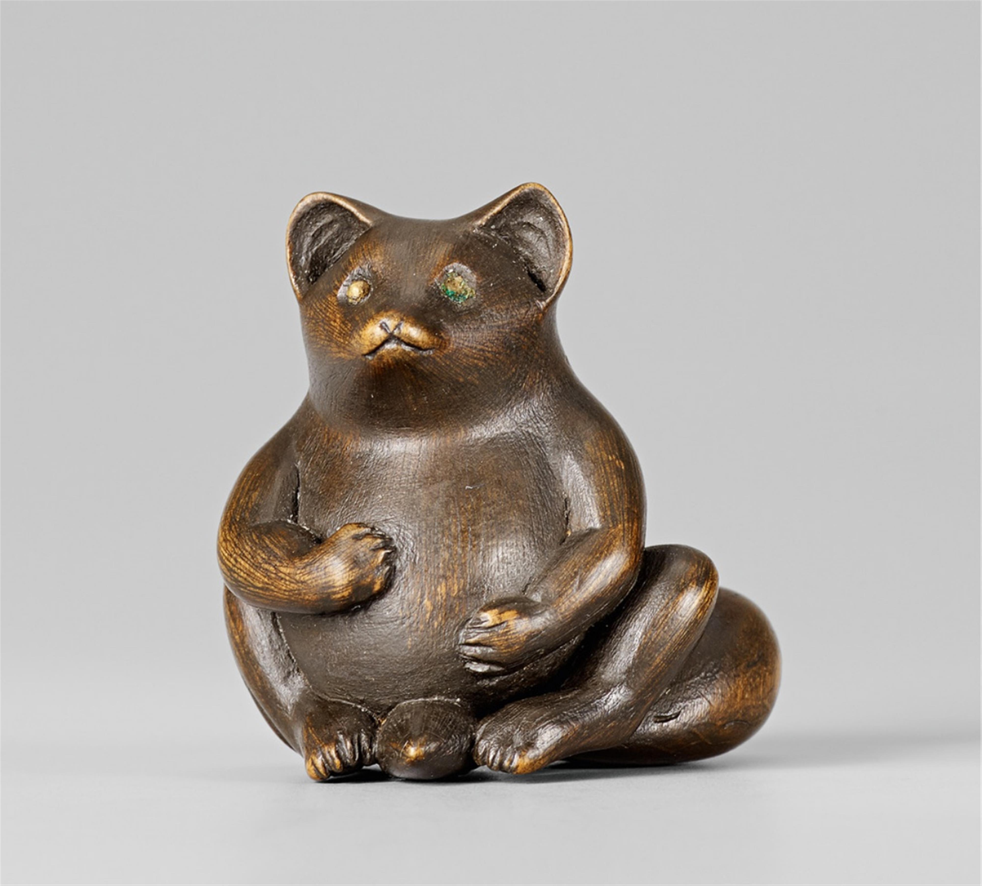 A fine wood netsuke of a tanuki, by Ryôkô. Late 19th /20th century - image-1