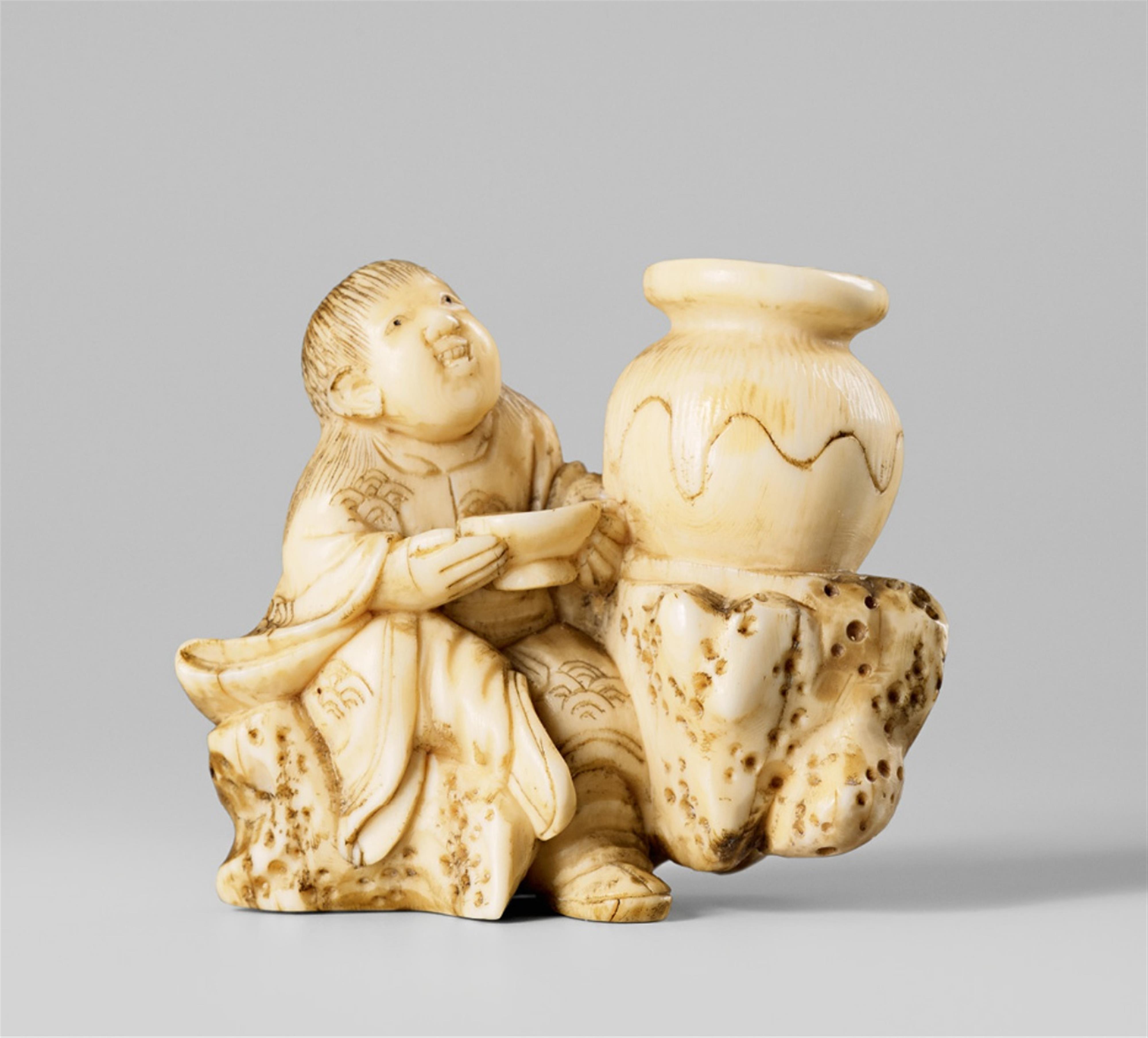 A marine ivory netsuke of a shôjô with a sake cup. Late 19th century - image-1