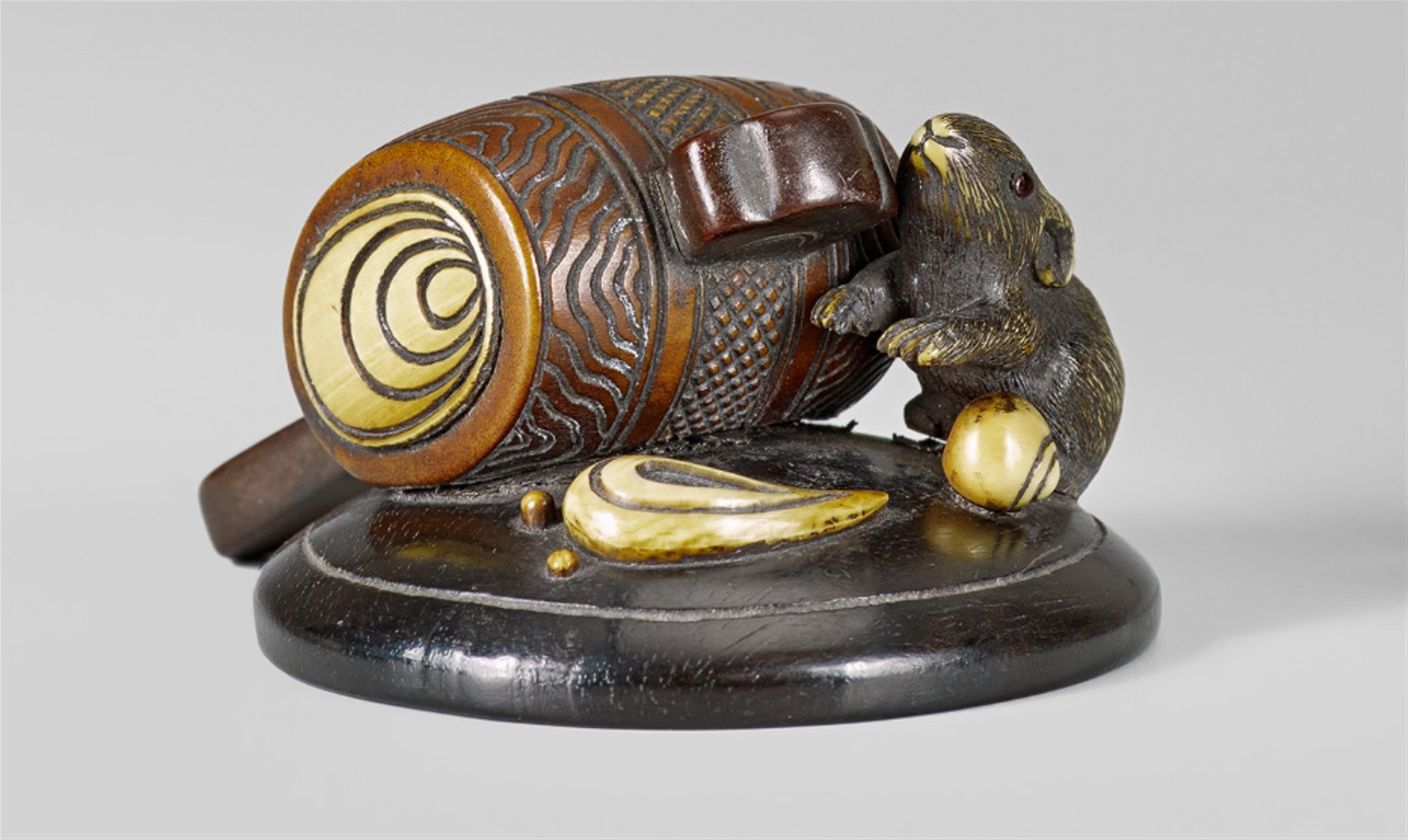 A wood and ivory netsuke of takaramono and a rat. Late 19th century - image-1