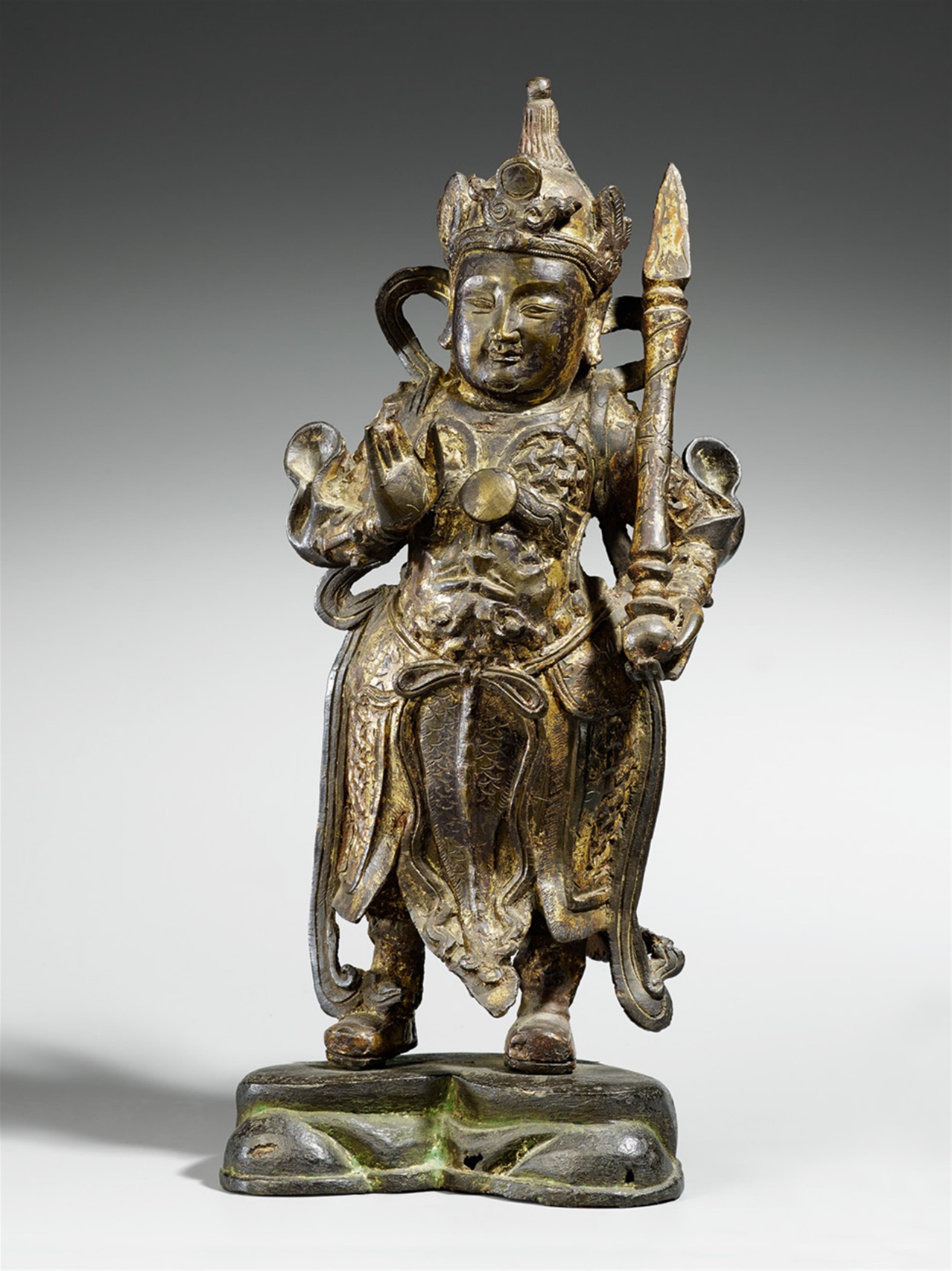 A lacquered and gilded bronze figure of a Buddhist guardian. Ming dynasty - image-1