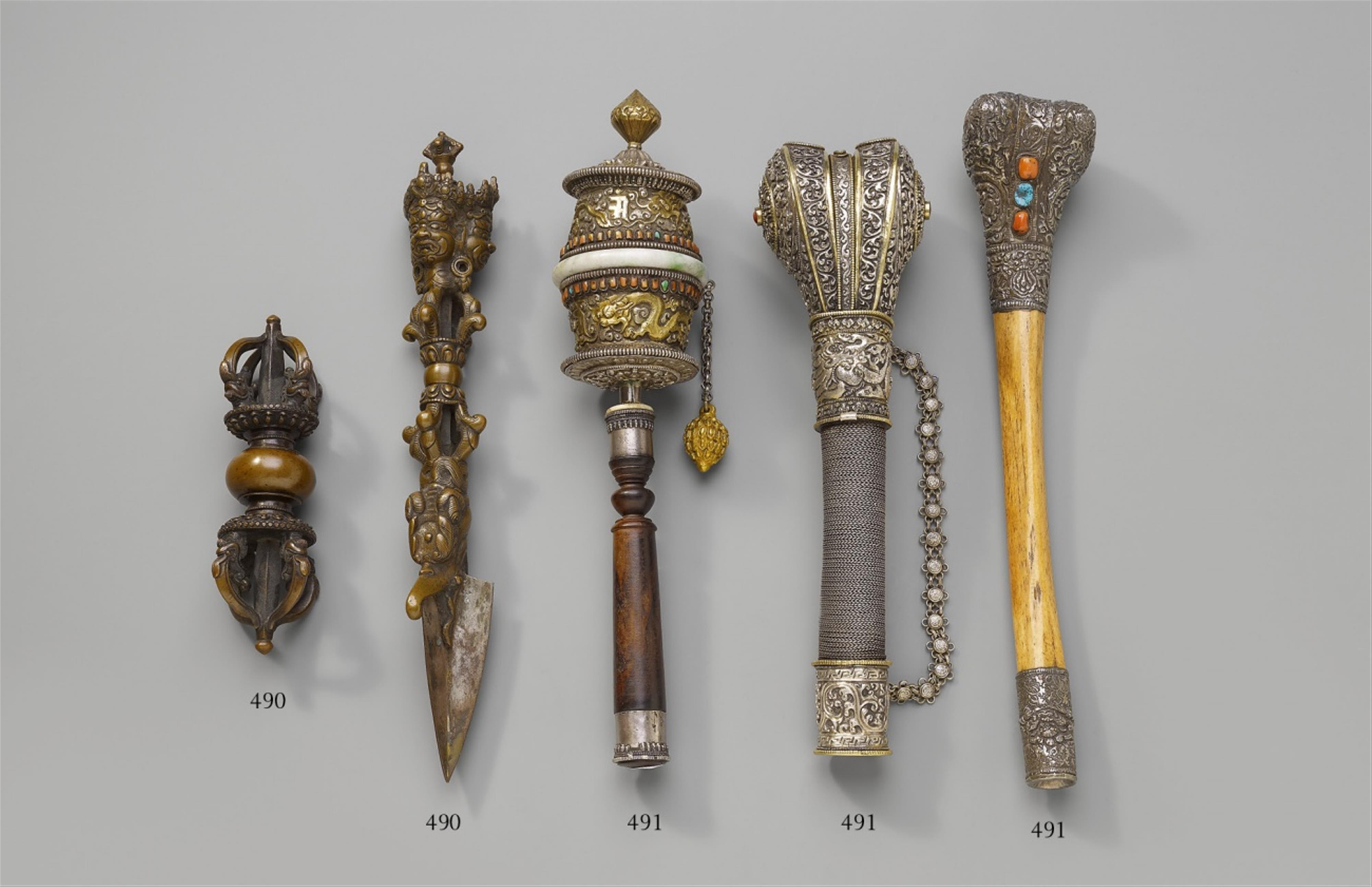 A group of a Tibetan prayer-wheel and silver trumpets - image-1