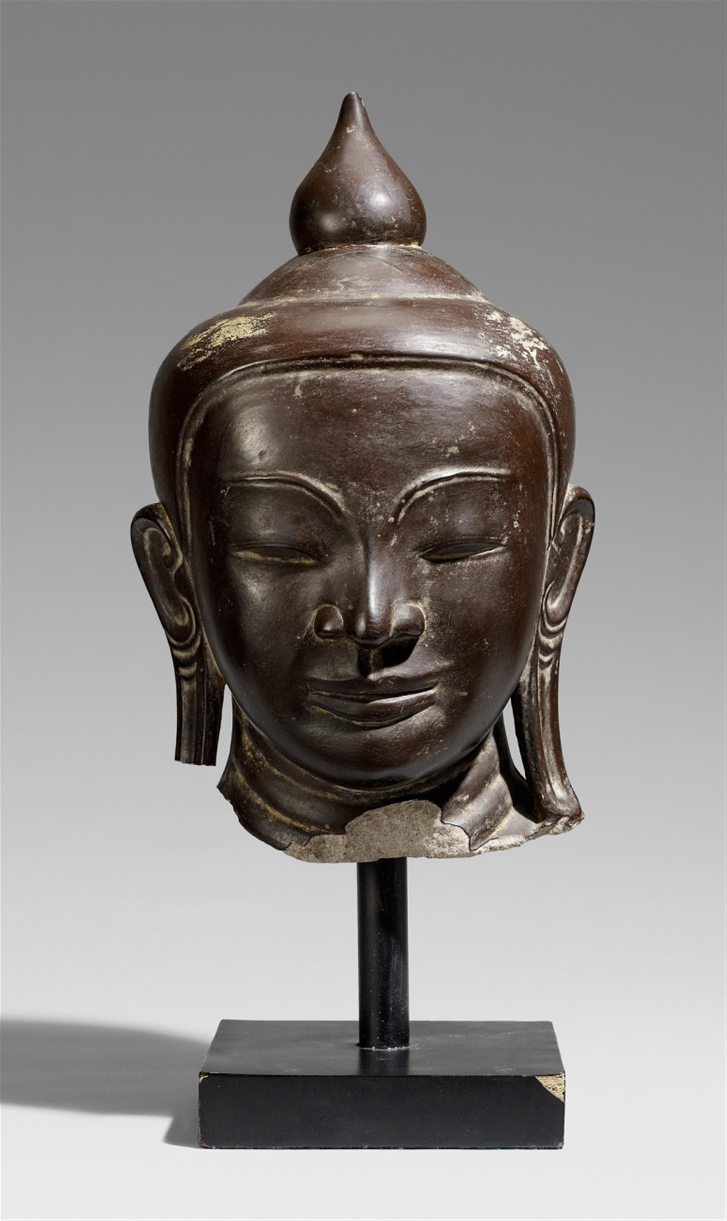 An Ava-style lacquered stone head of a Buddha. Burma. 17th century or later - image-1