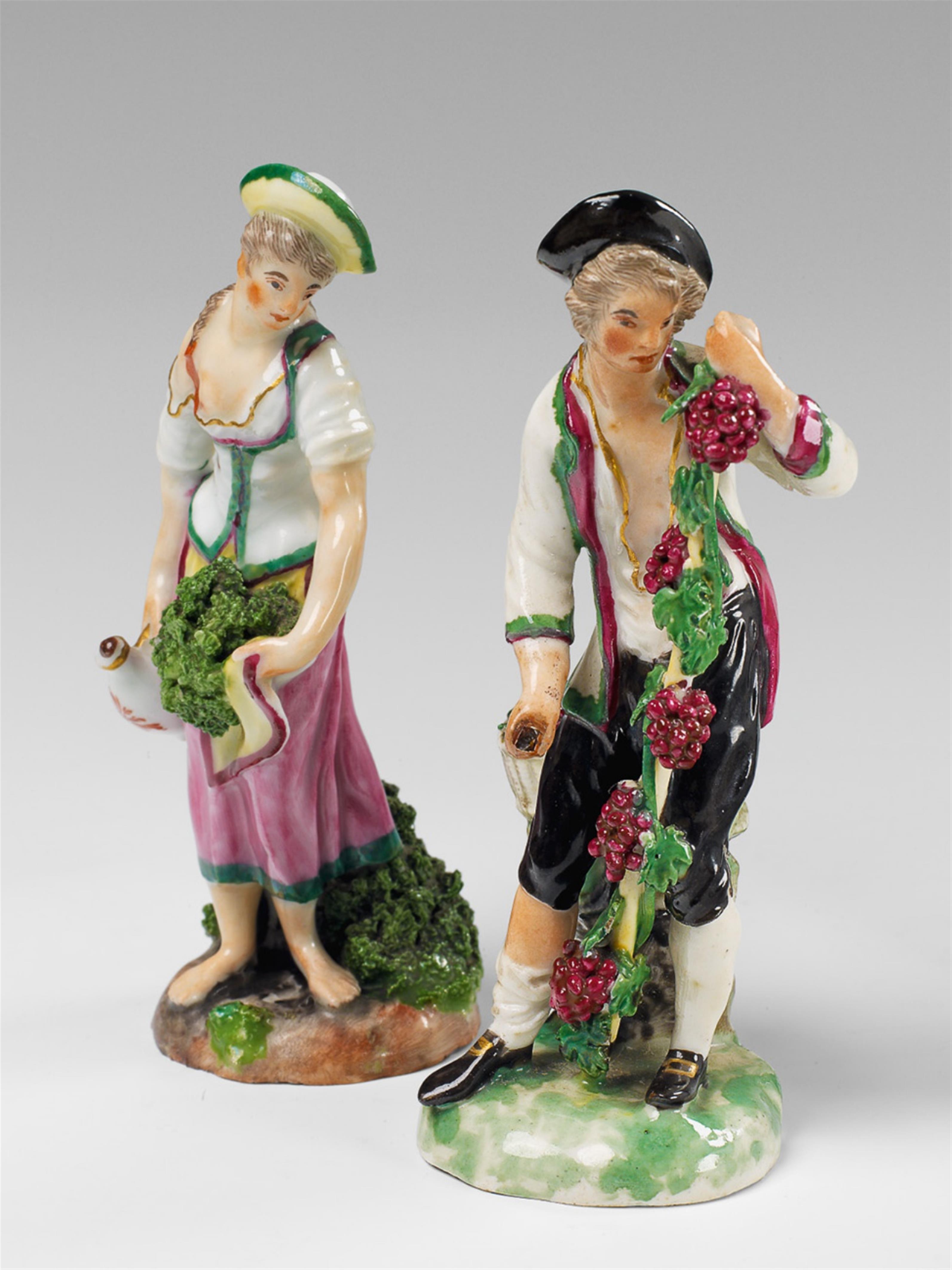 A pair of Ludwigsburg porcelain figures of wine growers. - image-1