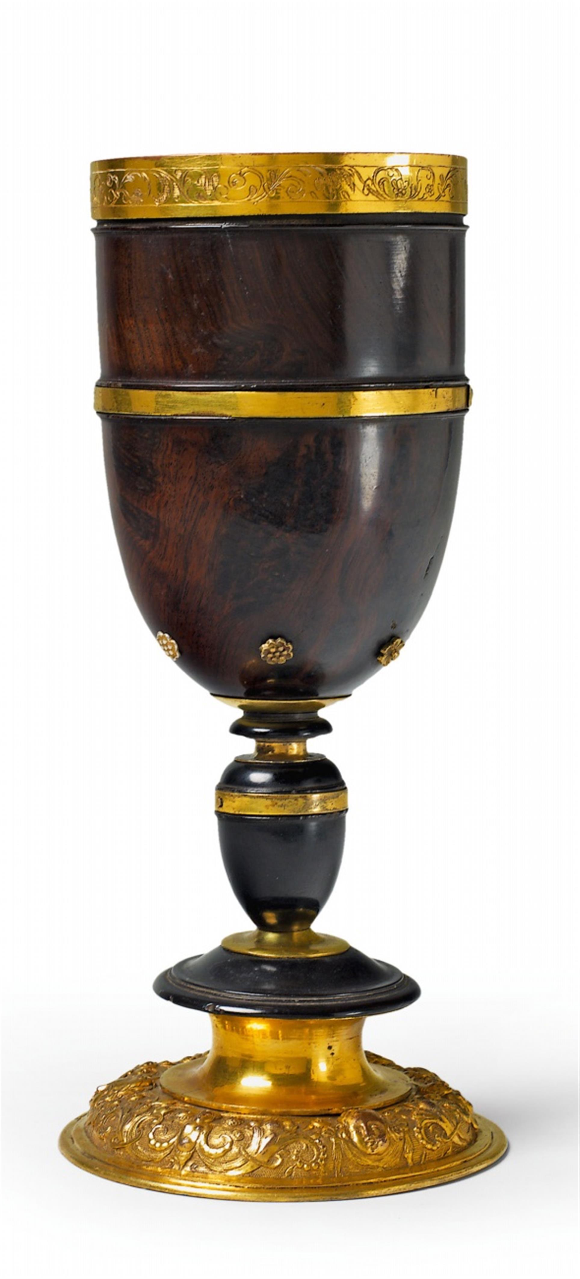 A rare gilt copper mounted "lignum vitae" wood chalice. - image-1