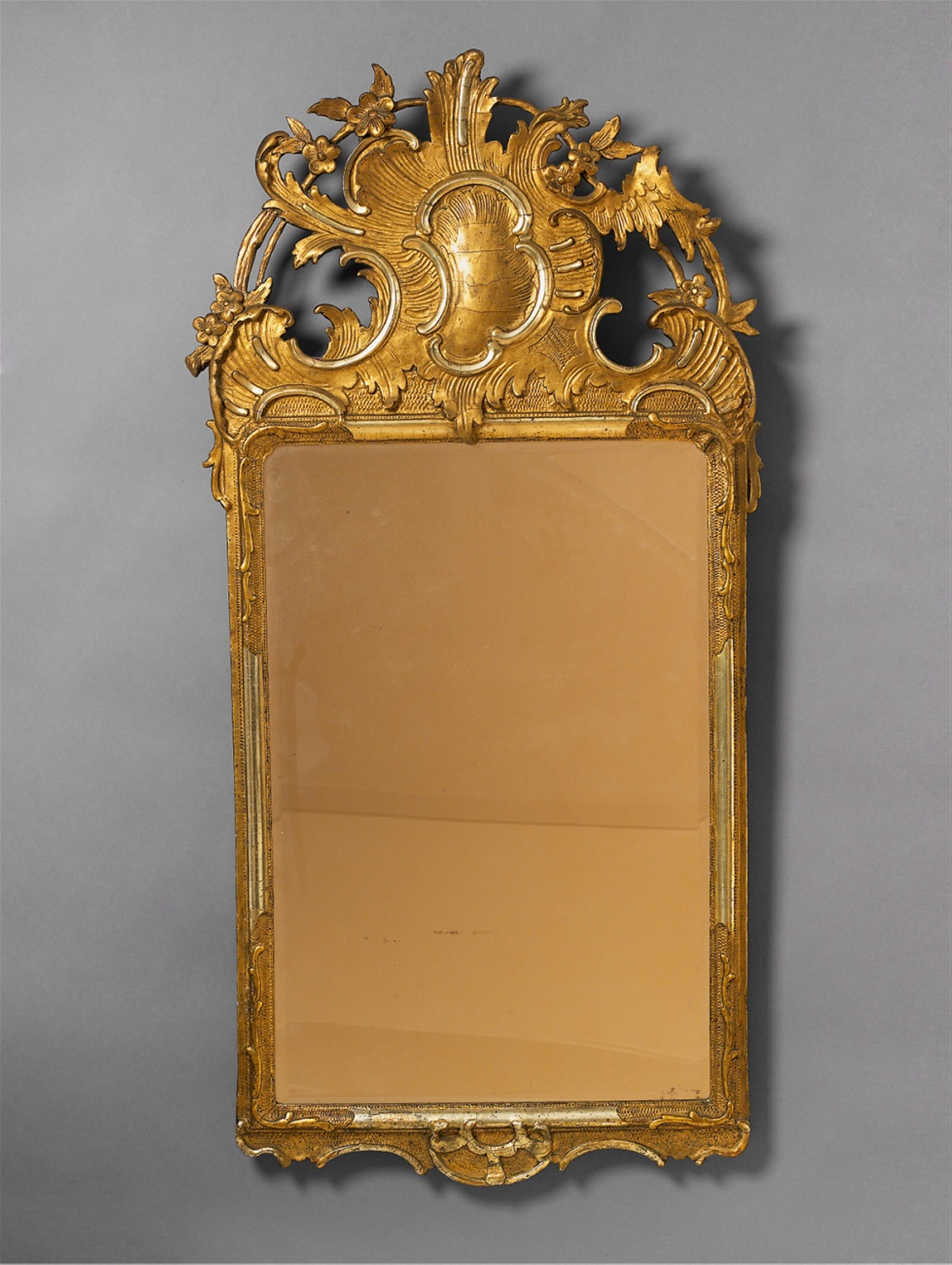 A German gilt and silvered softwood mirror. - image-1