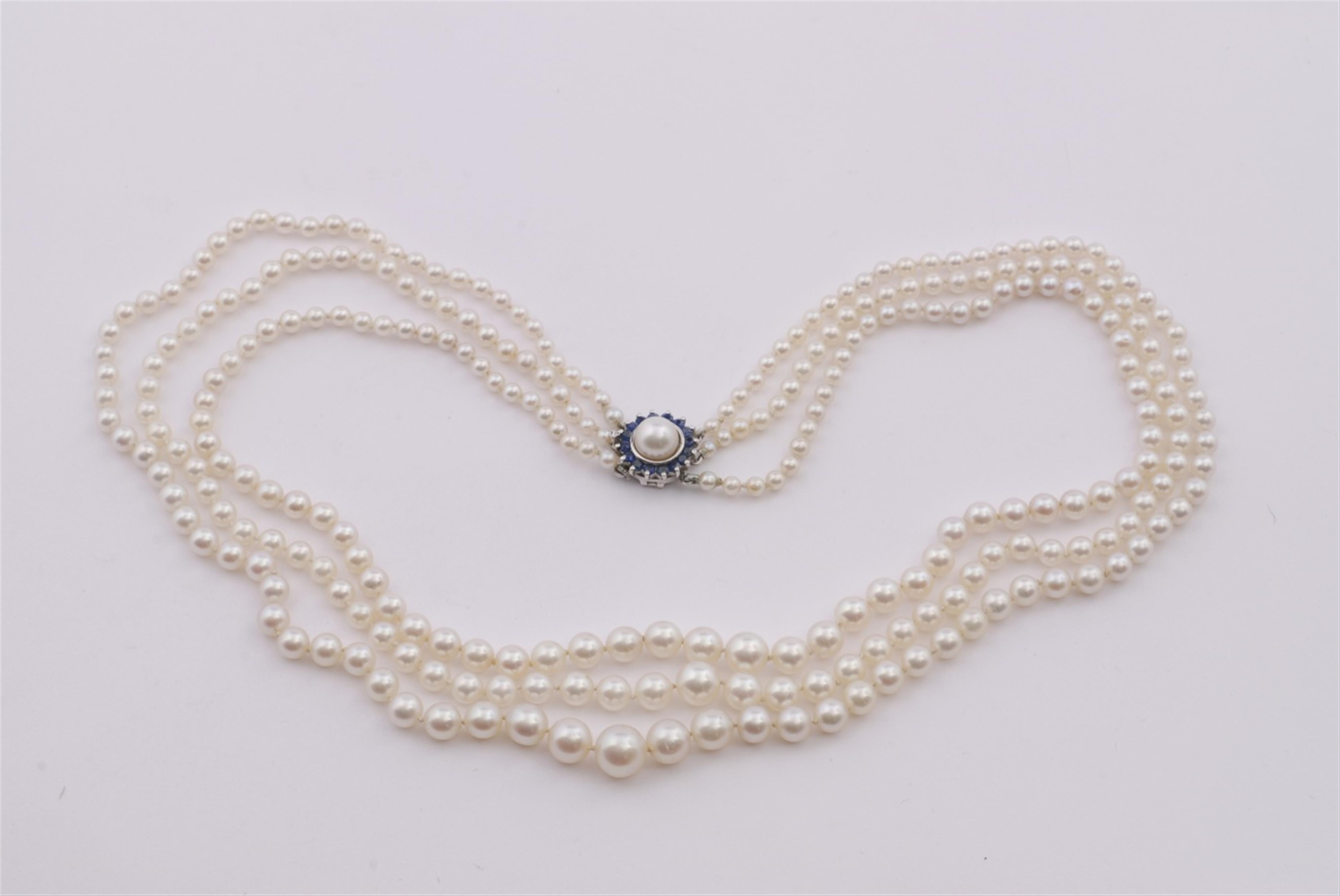 A pearl collier with an 18k white gold clasp. - image-1