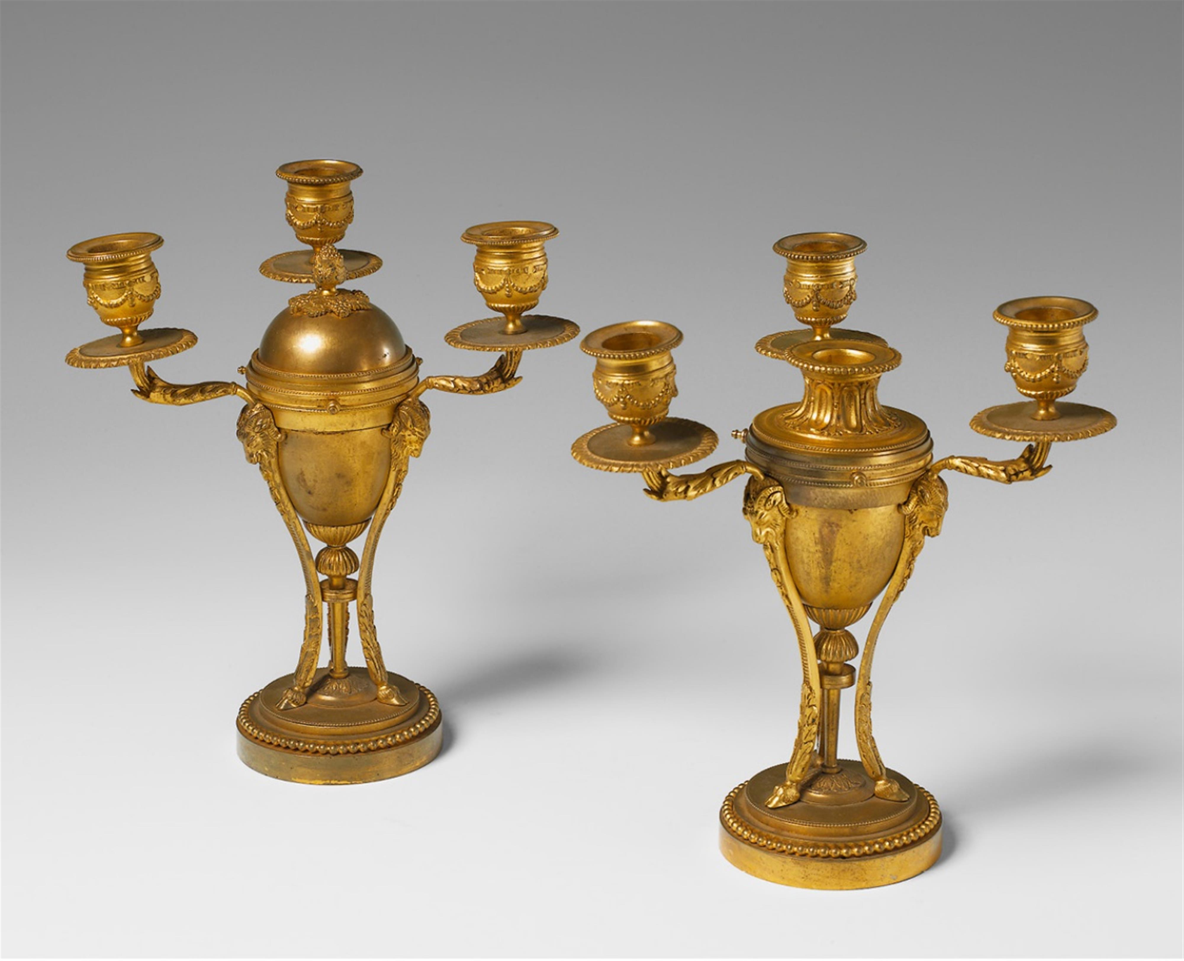 A pair of English gilt bronze and tin candelabra. - image-1