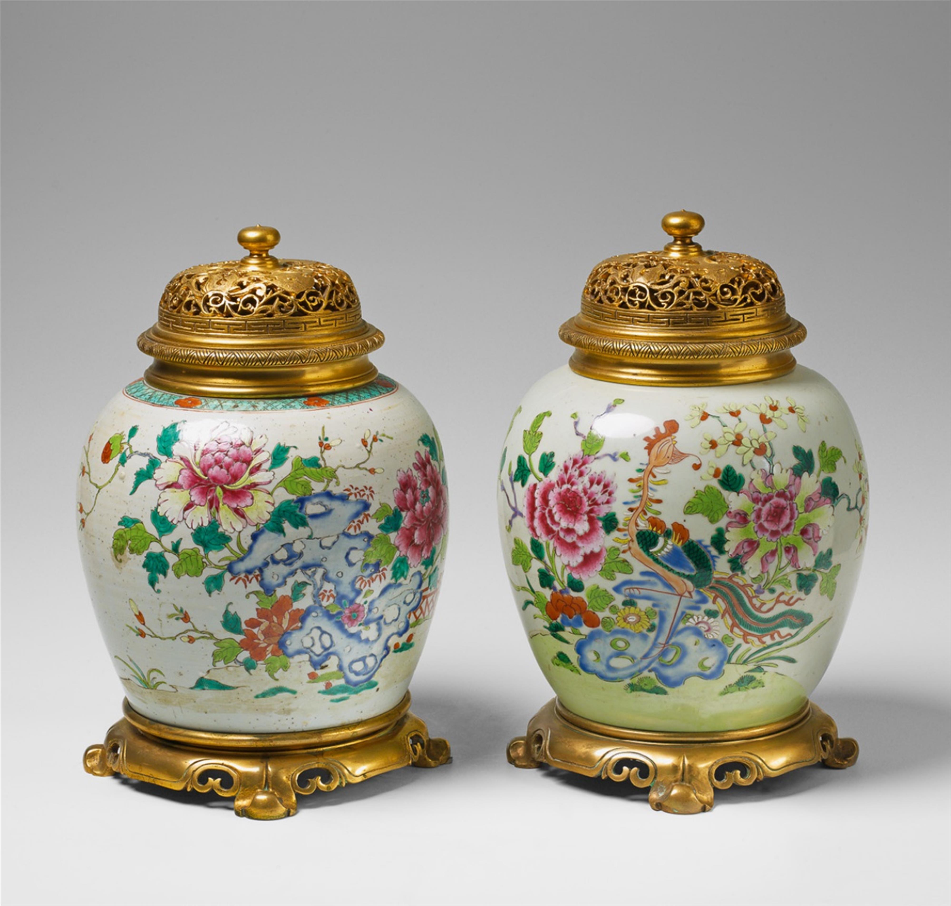 A pair of Japonisme style ormolu mounted famille rose vases. - image-1