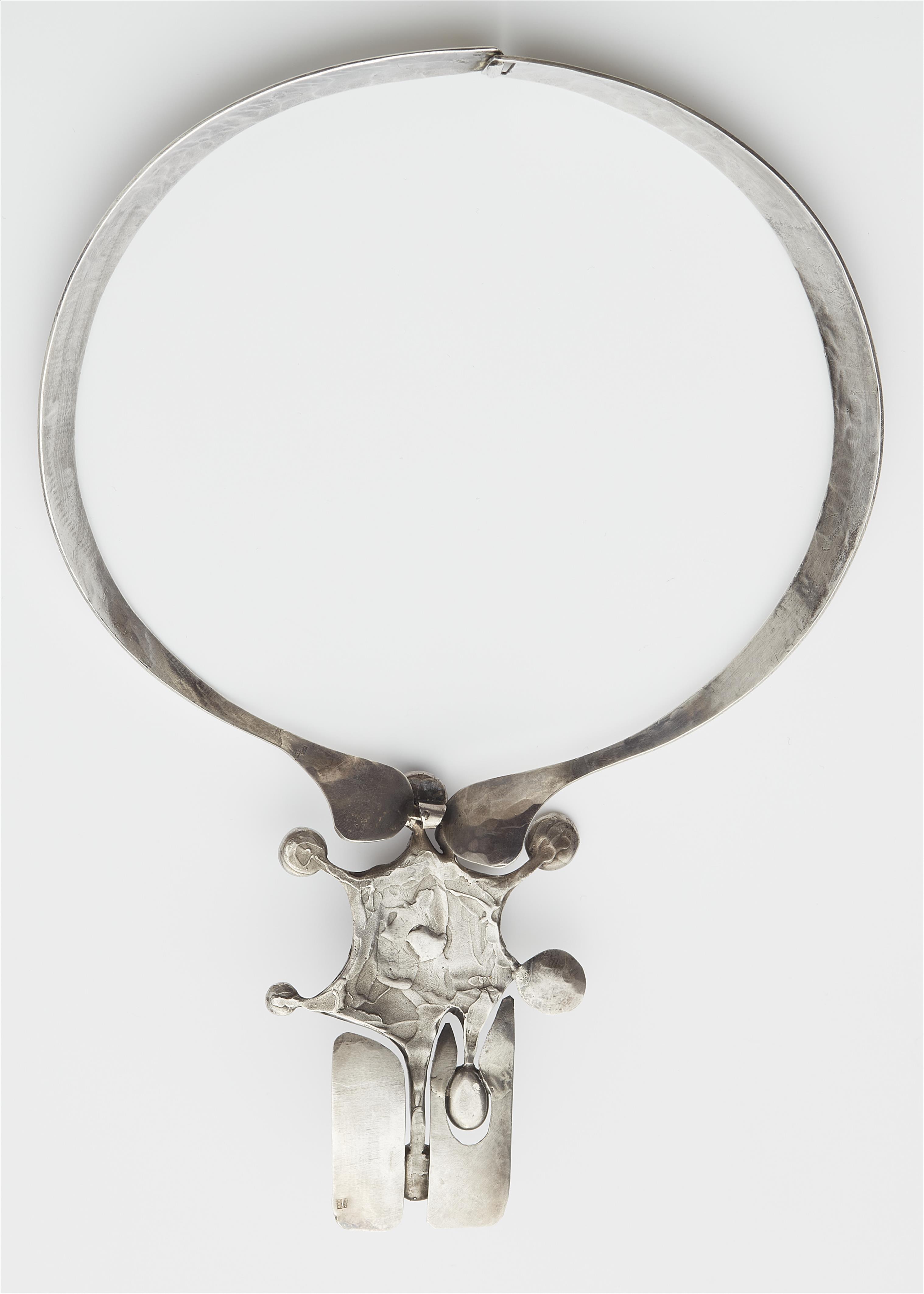 A Vienna silver necklace with a large carbuncle pendant. - image-1