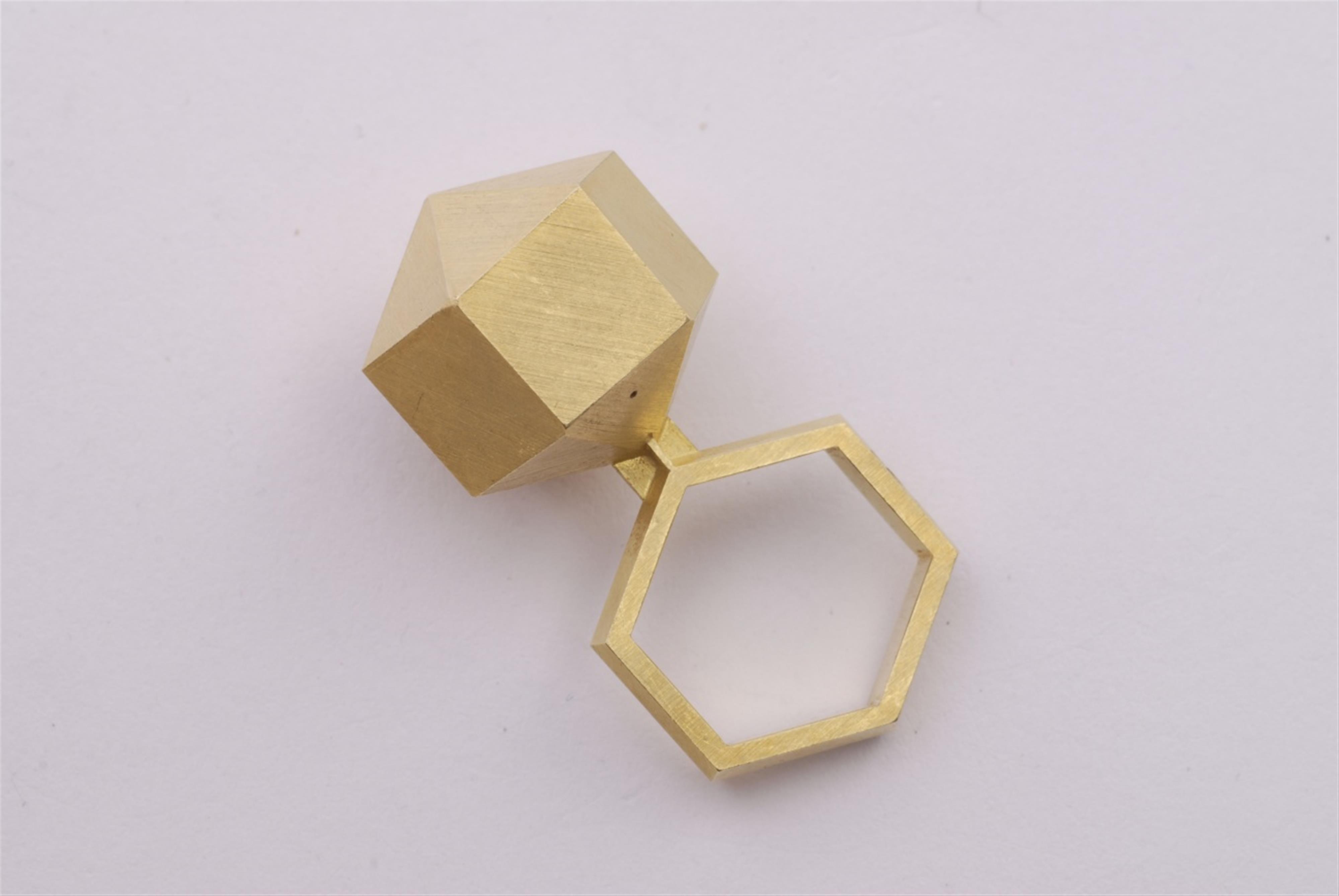 An 18k gold geometric ring. - image-2