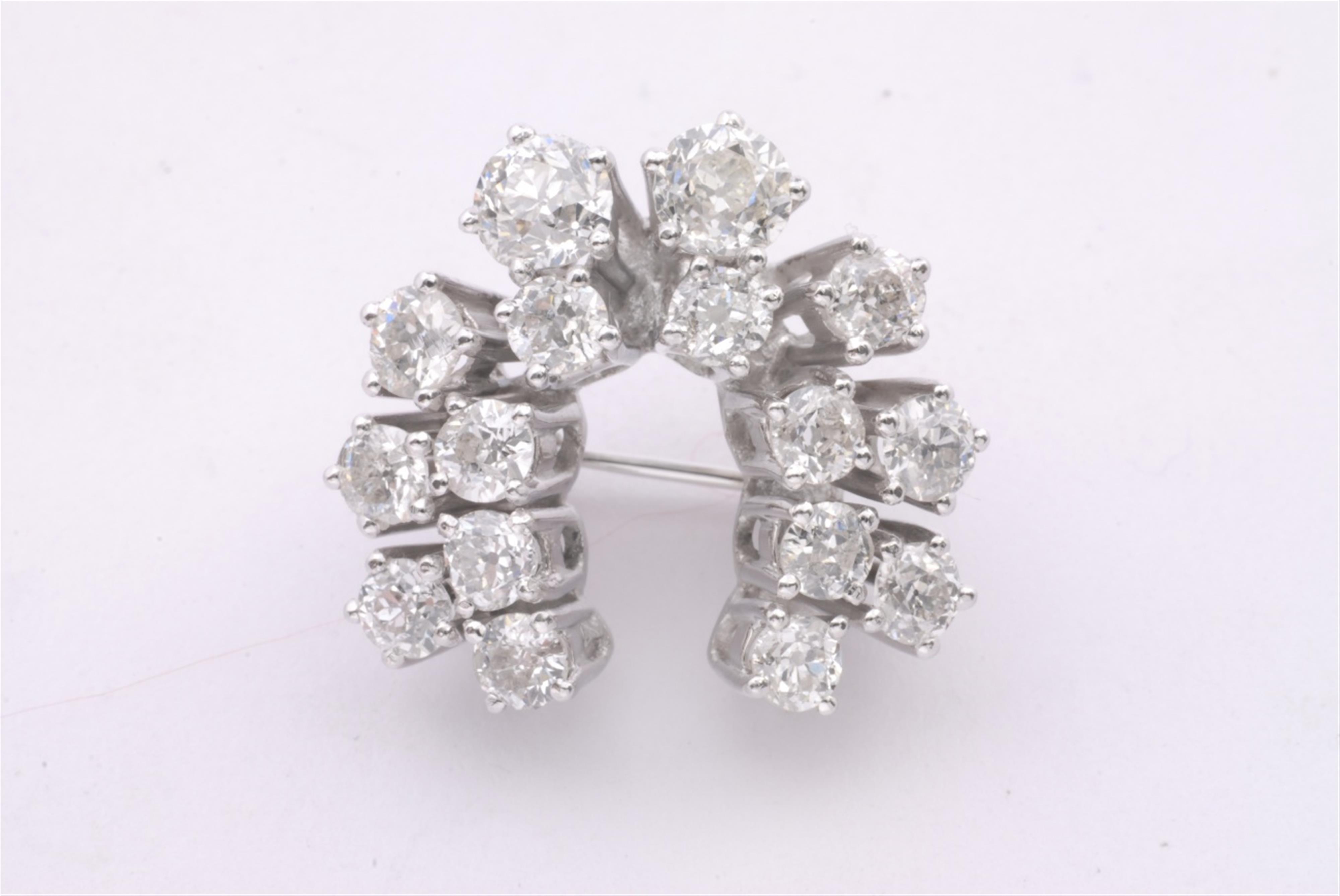 An 18k white gold and diamond brooch - image-1