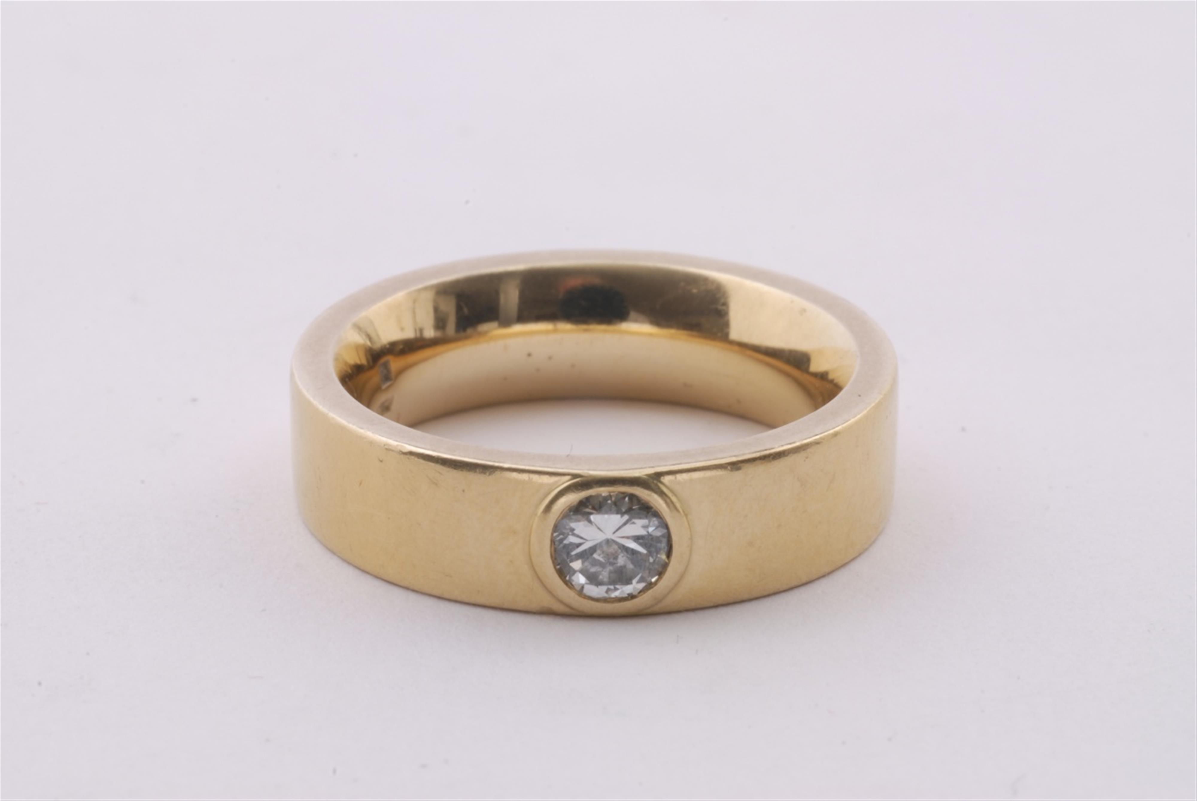 An 18k gold gentleman's diamond solitaire ring. - image-1
