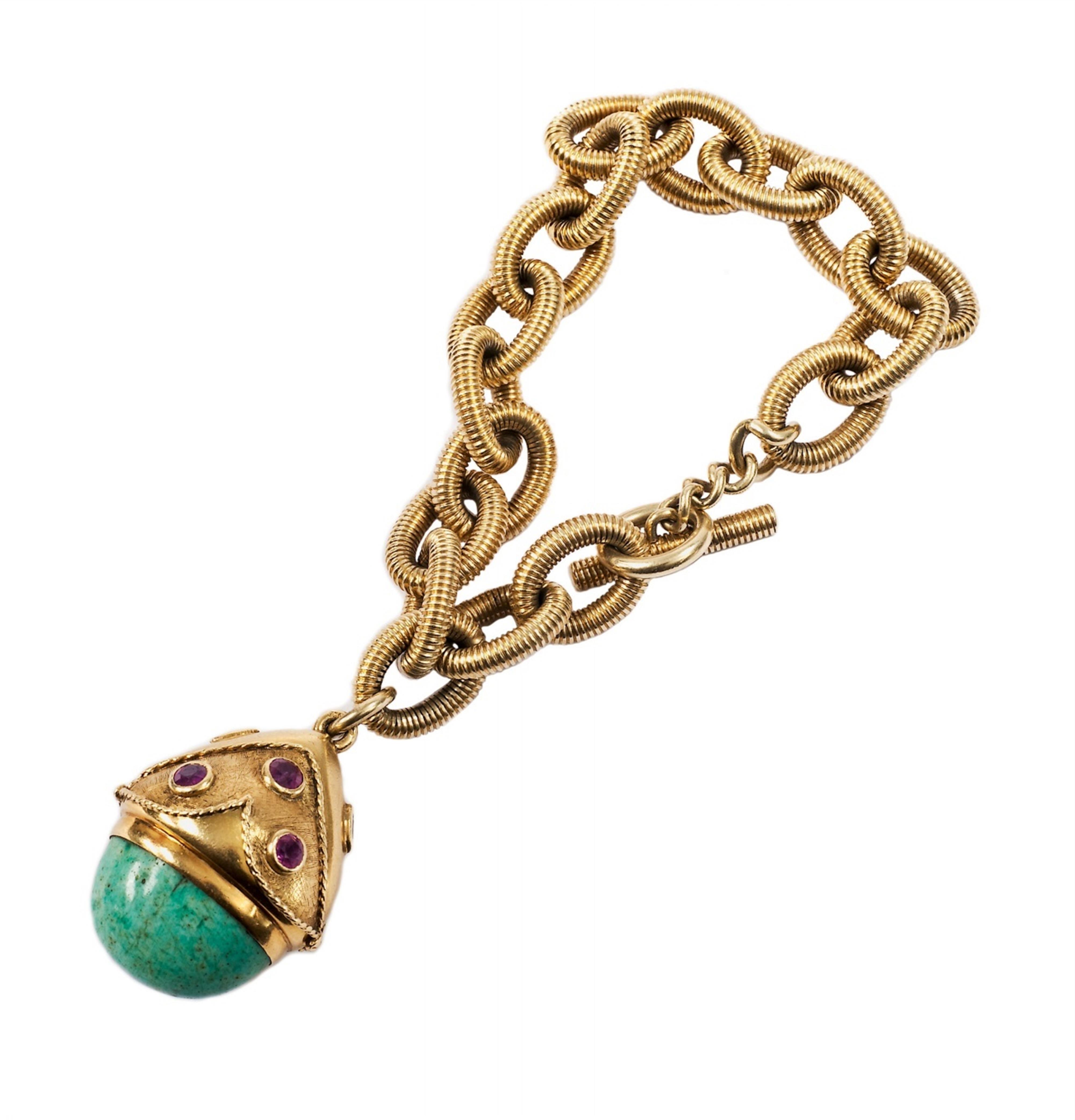 An 18k gold charm bracelet - image-1