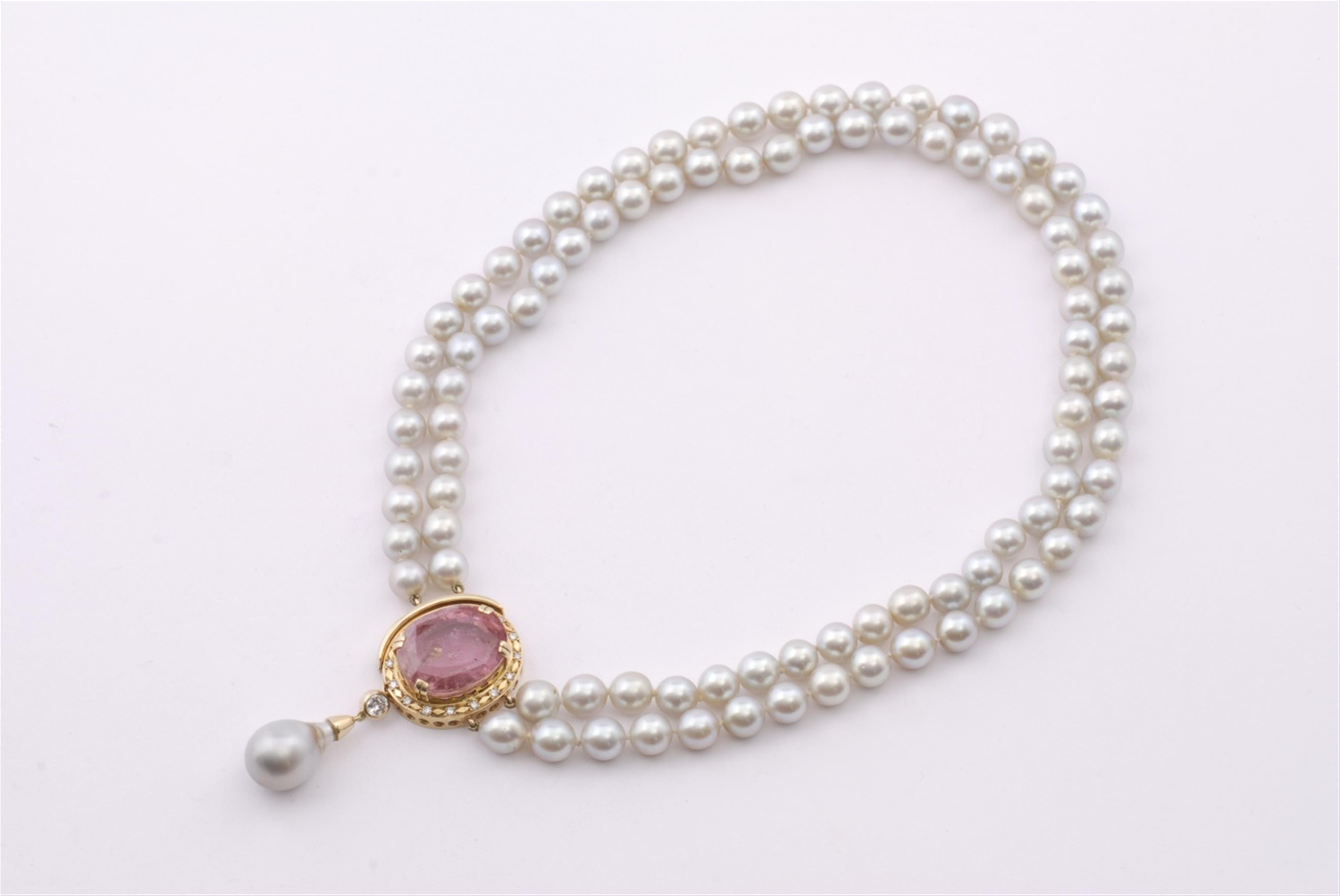 A pearl necklace with an 18k gold and tourmaline clasp. - image-1