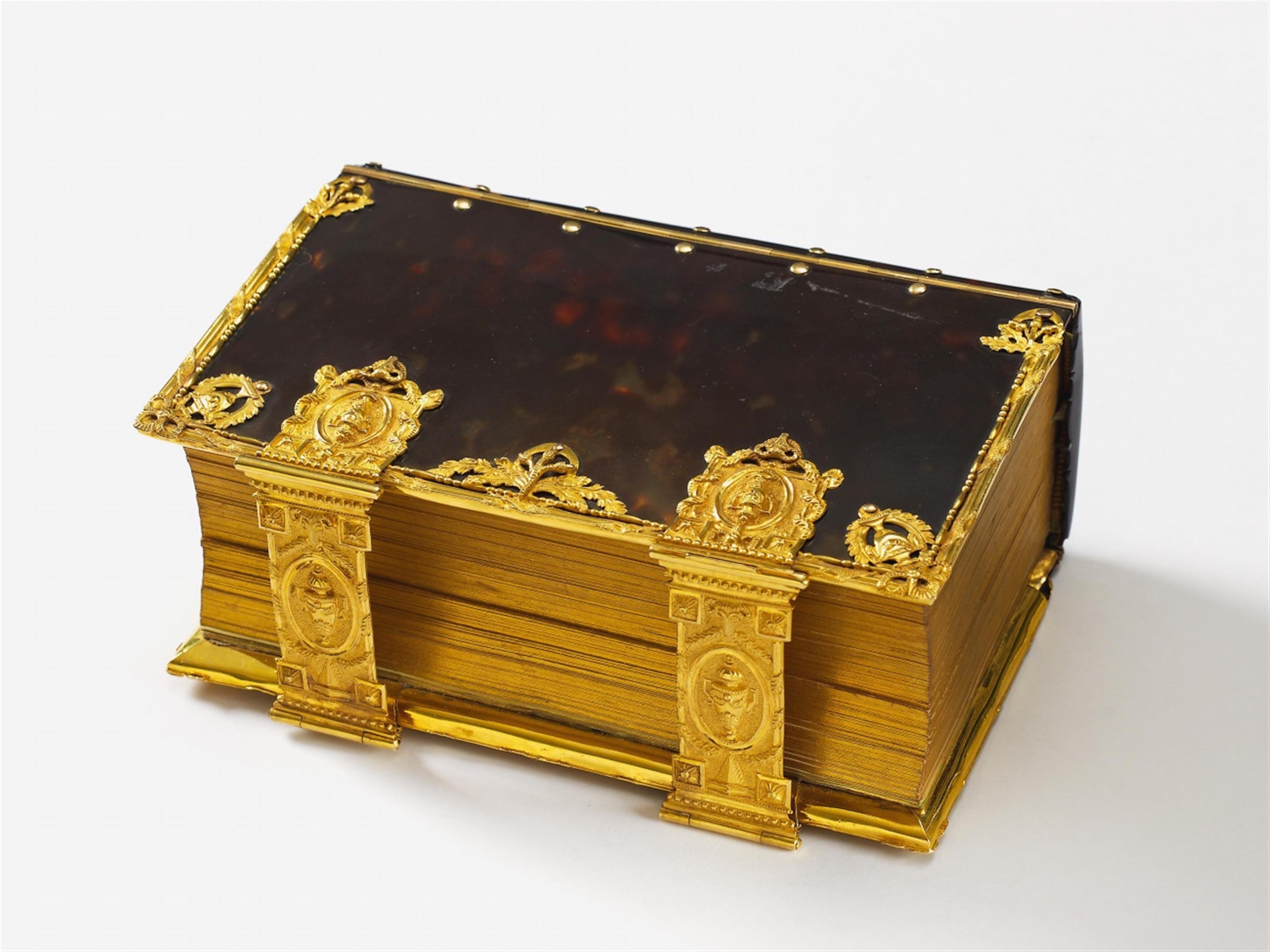 A copy of the New Testament bound in 18k gold and tortoiseshell. - image-1