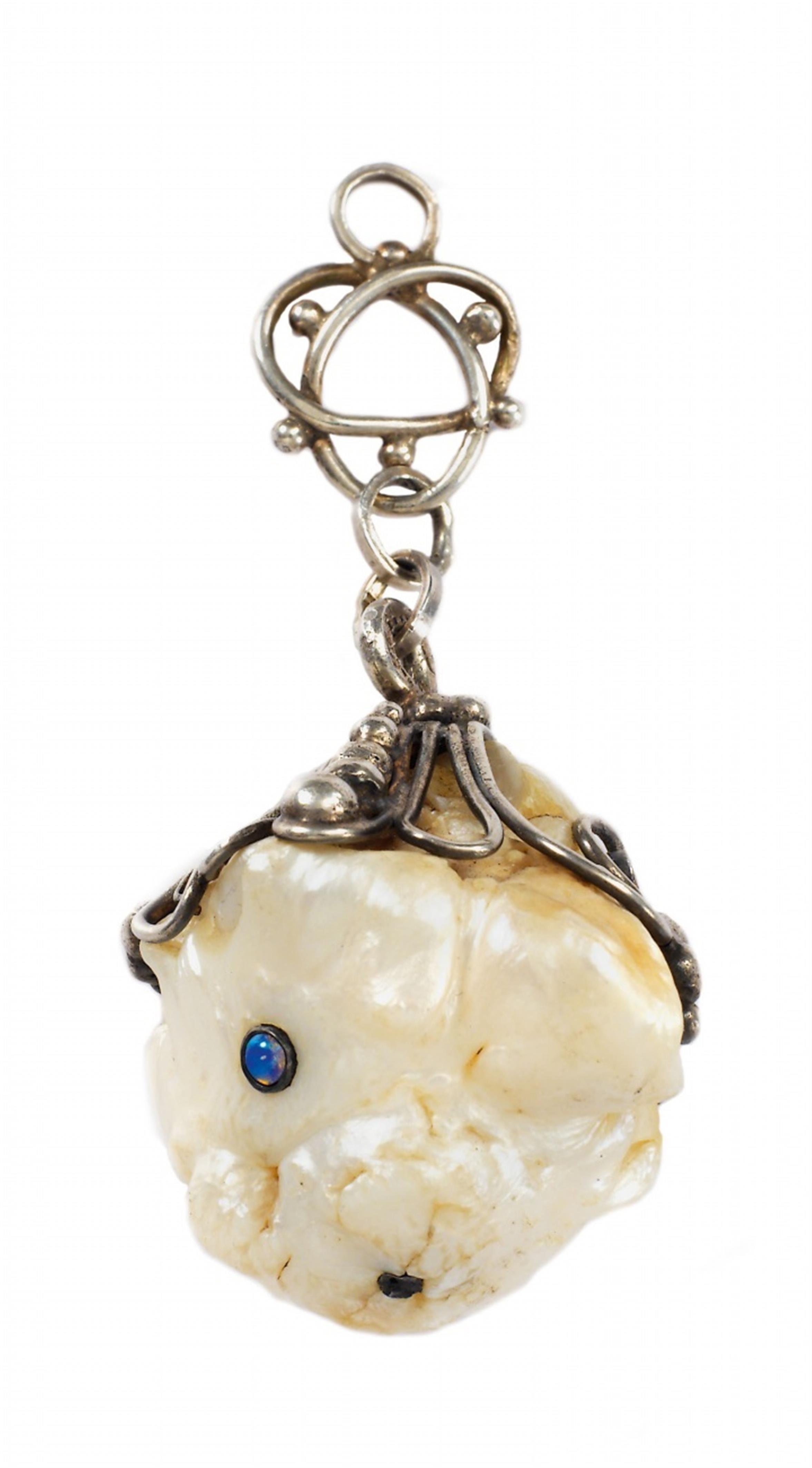 A silver and natural pearl pendant. - image-1