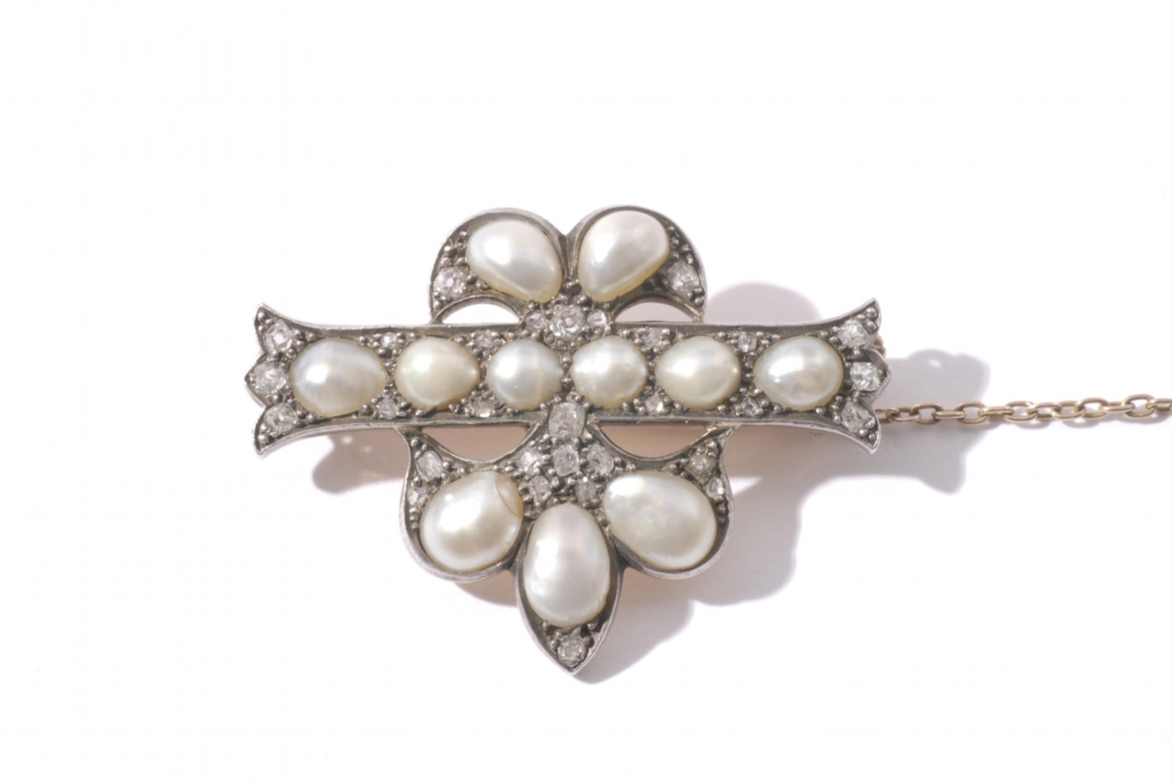 A silver and 14k gold Oriental pearl brooch. - image-1