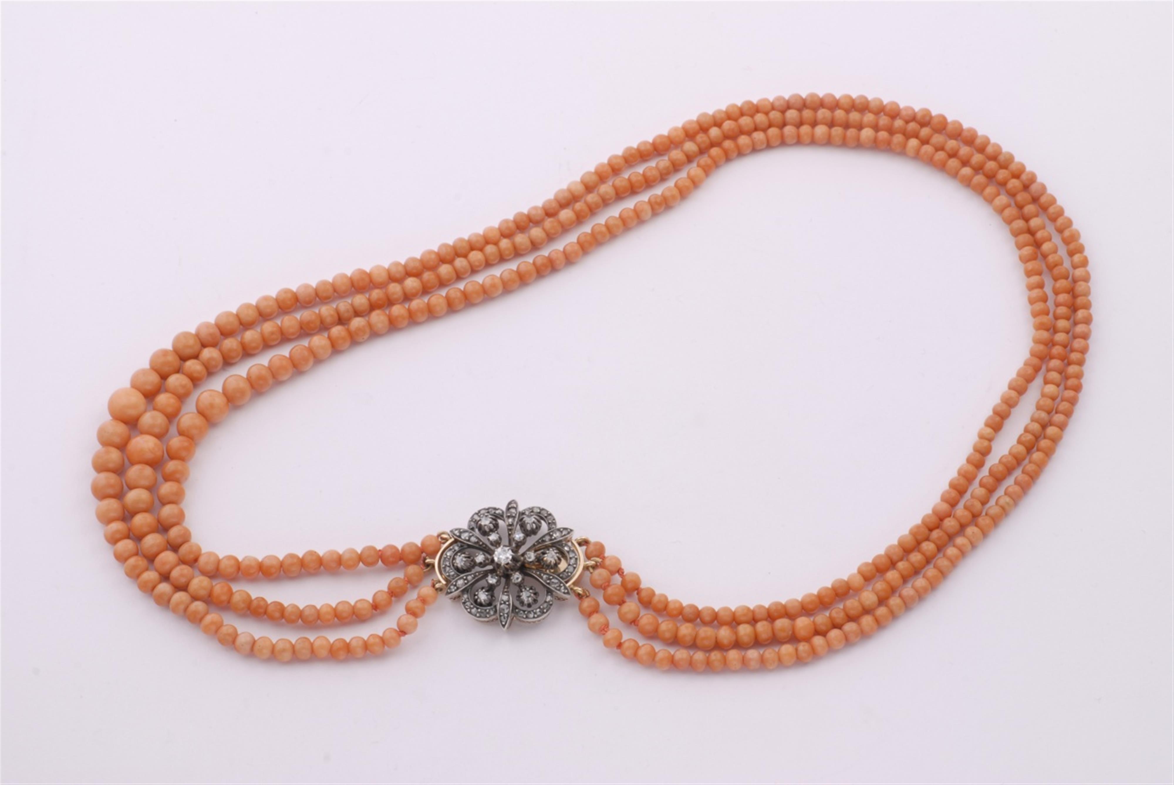 A coral collier with a 14k red gold and diamond clasp. - image-1