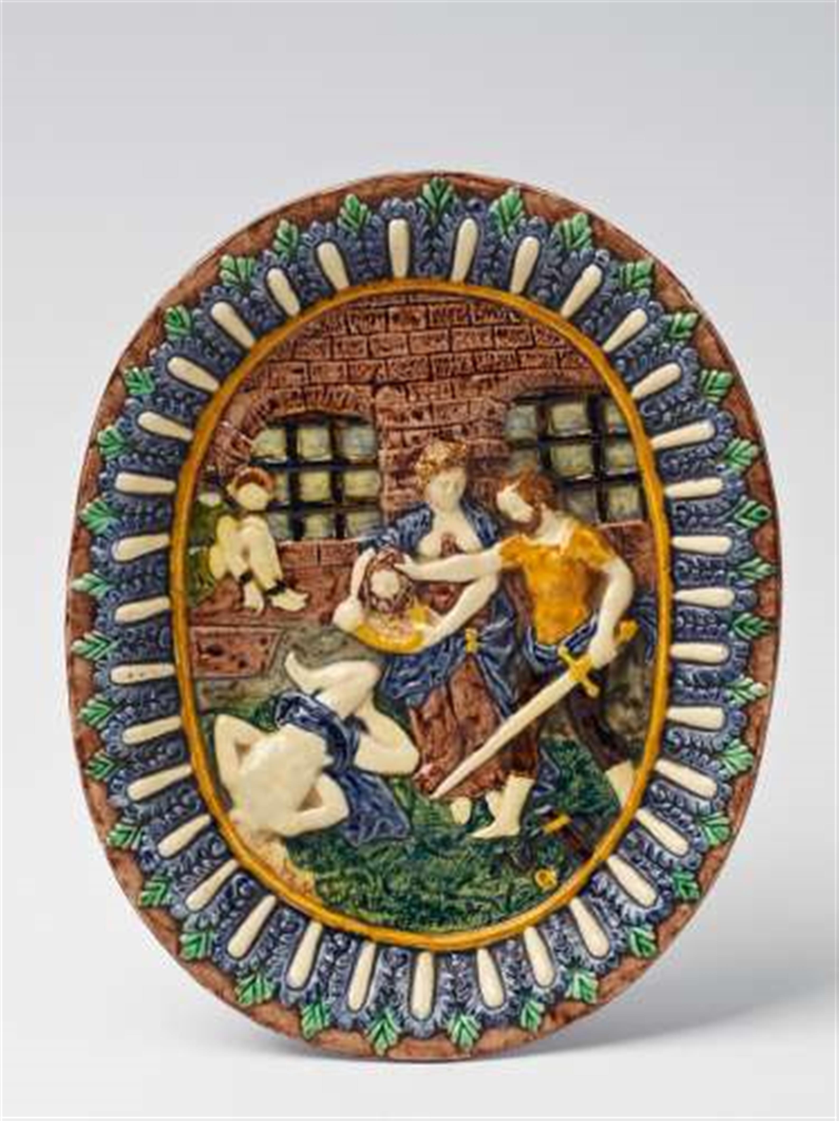 A French maiolica dish with a relief depiction of the martyrdom of John the Baptist. - image-2