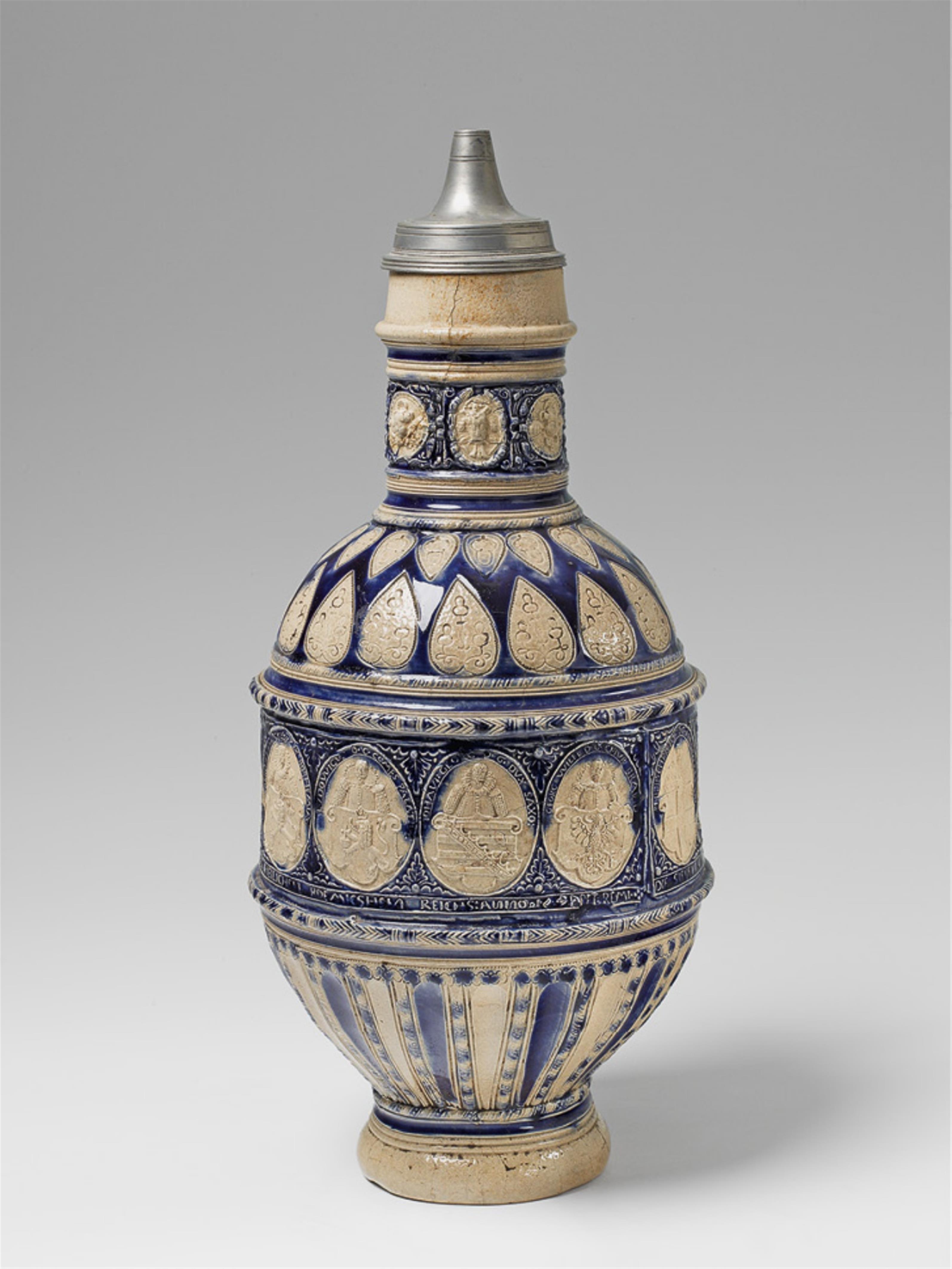 A large, tin-mounted Raeren salt-glazed stoneware pitcher. - image-1