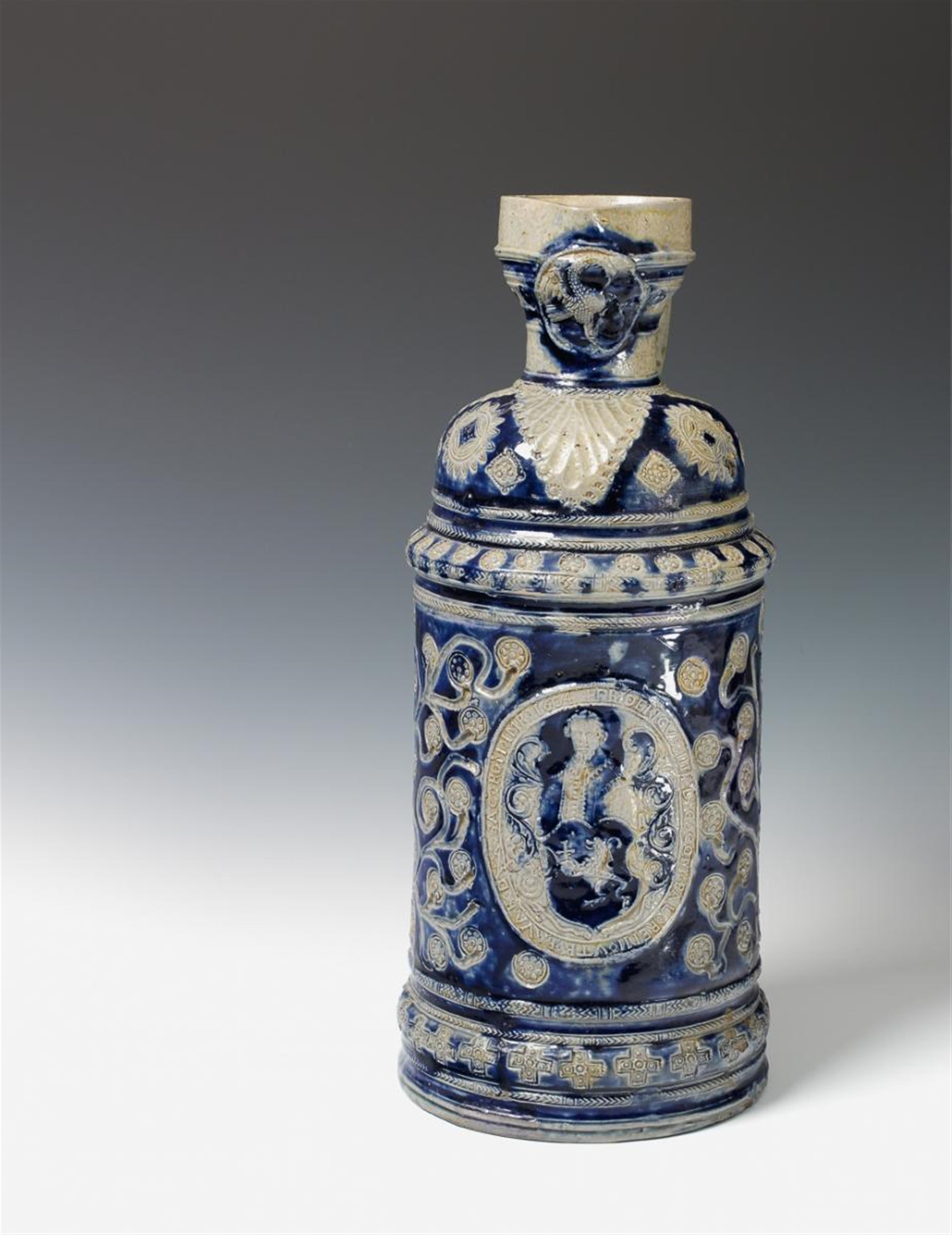 A rare grey salt-glazed Raeren stoneware jug. - image-1
