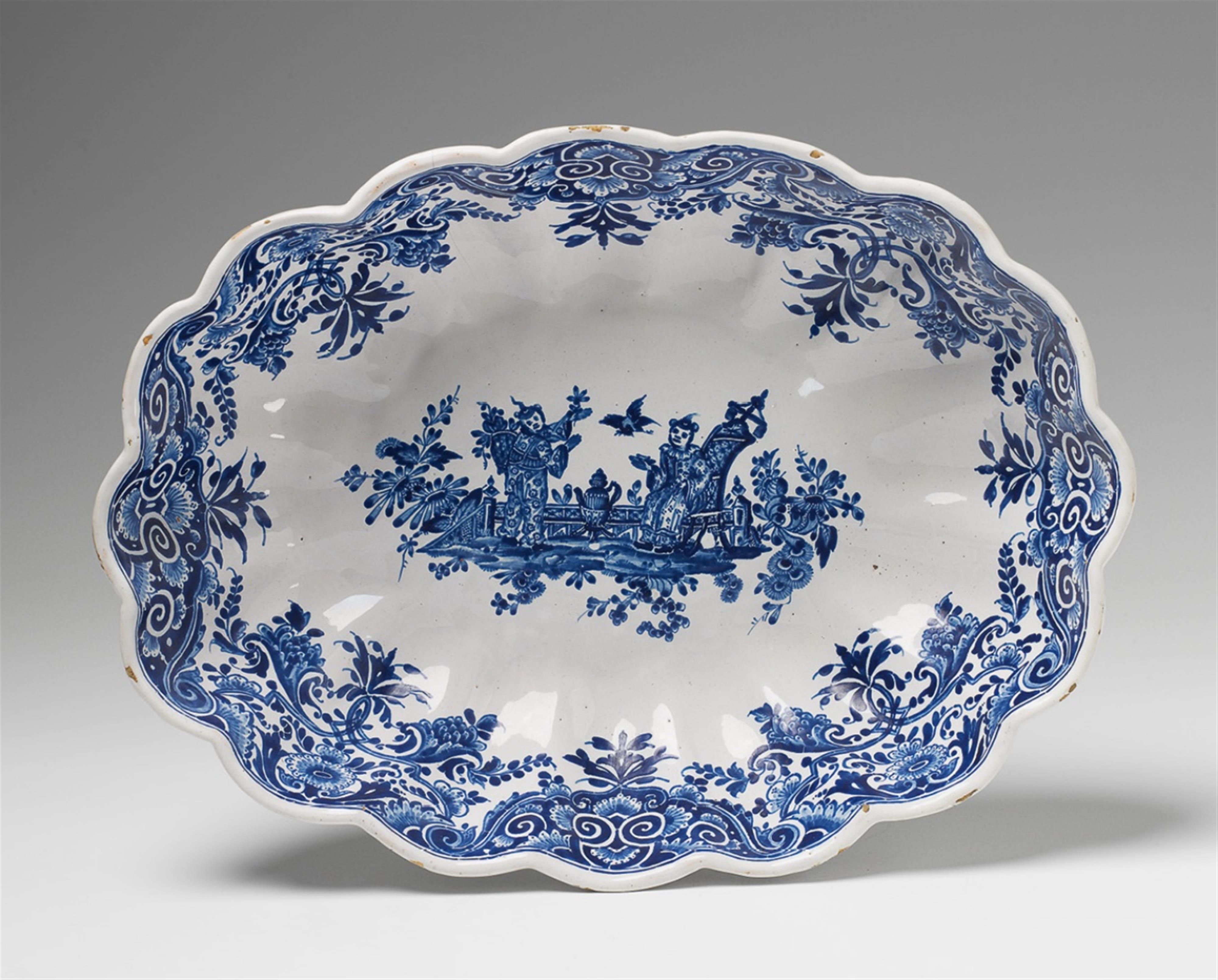 A faience washbasin with blue chinoiserie and lambrequin decor - image-1