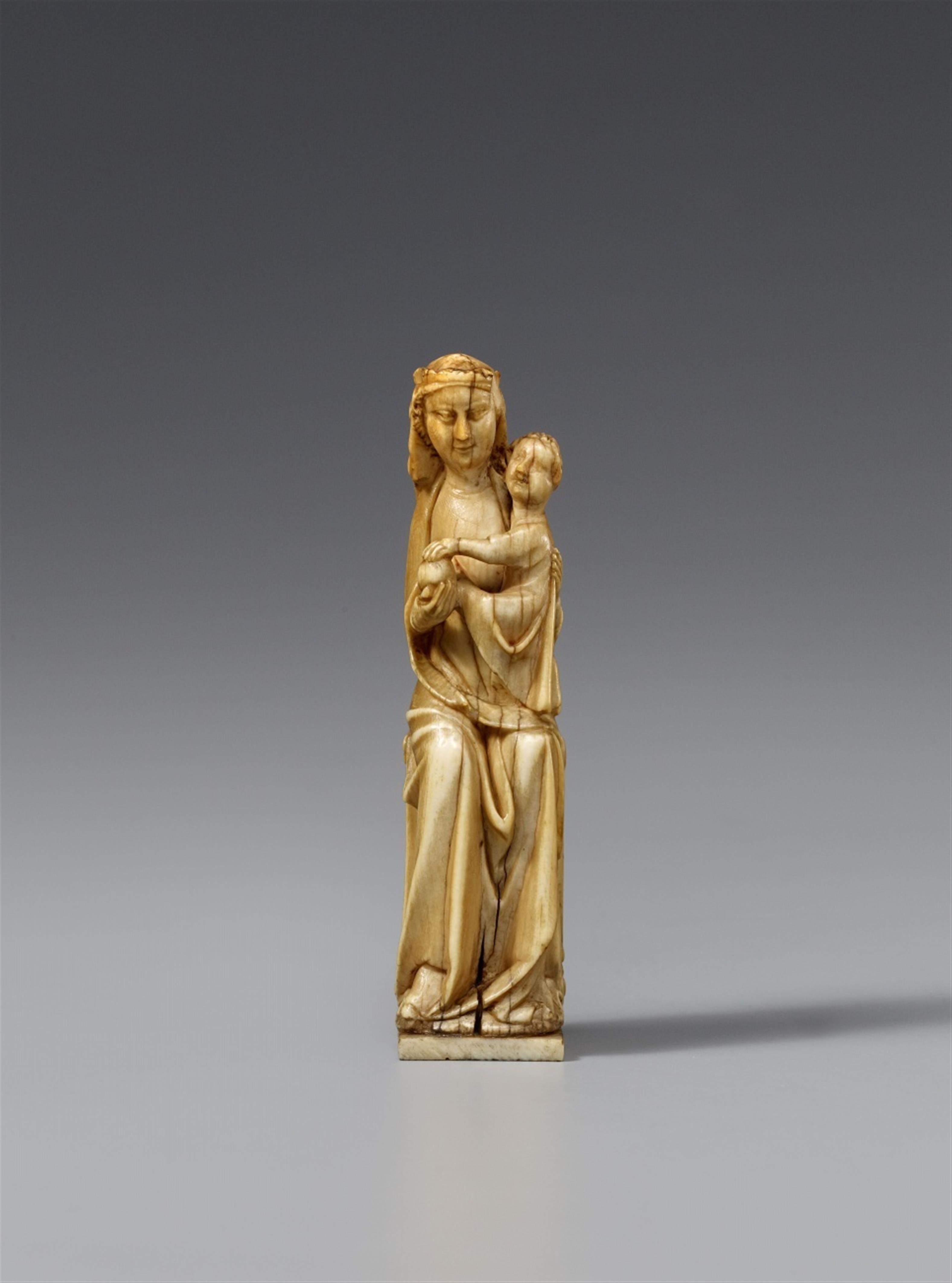 France first half 14th century - A French carved ivory figure of the Virgin Enthroned, first half 14th century. - image-1