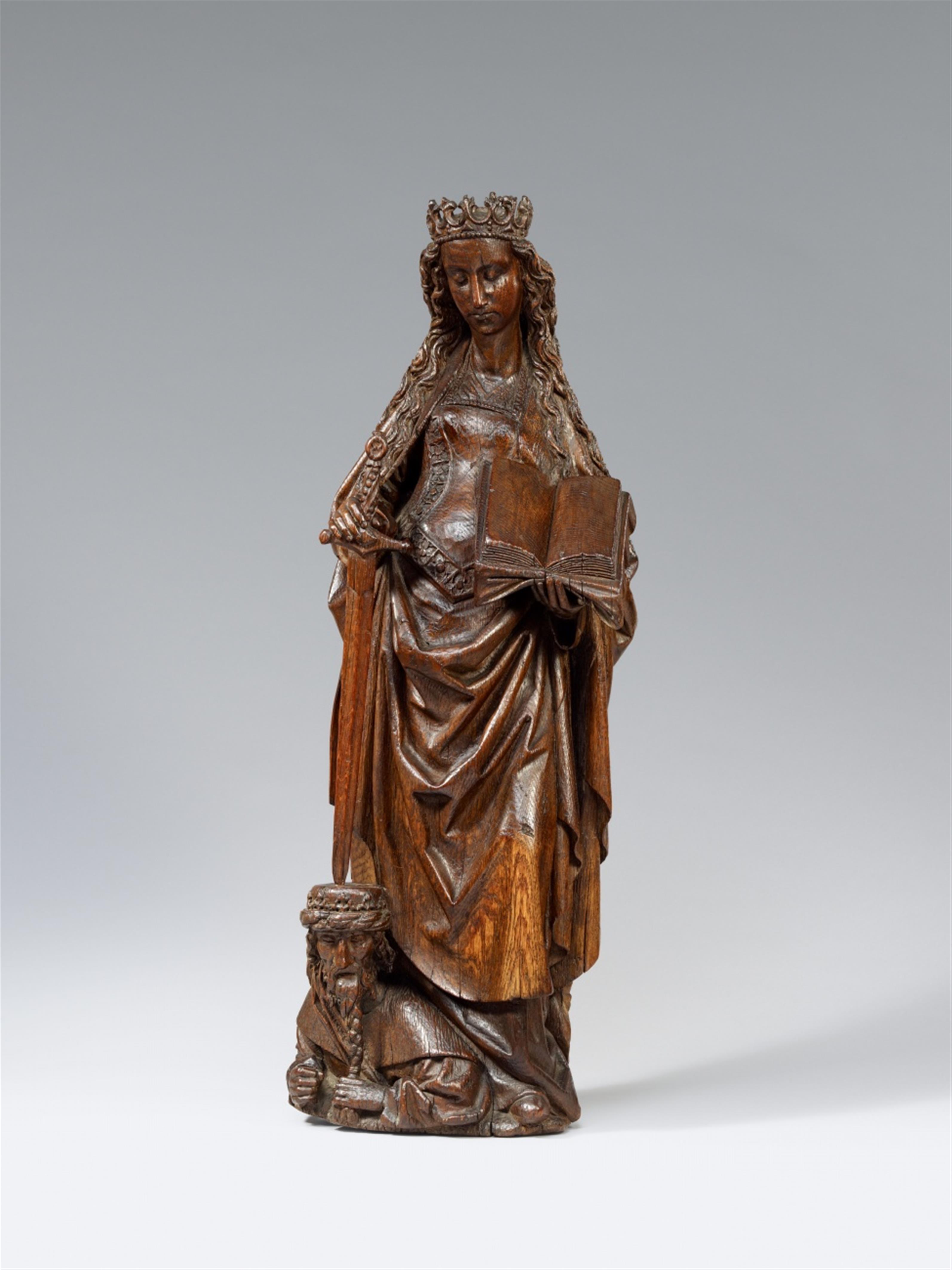 Flemish late 15th century - A late 15th century Flemish carved wooden figure of Saint Catherine. - image-1