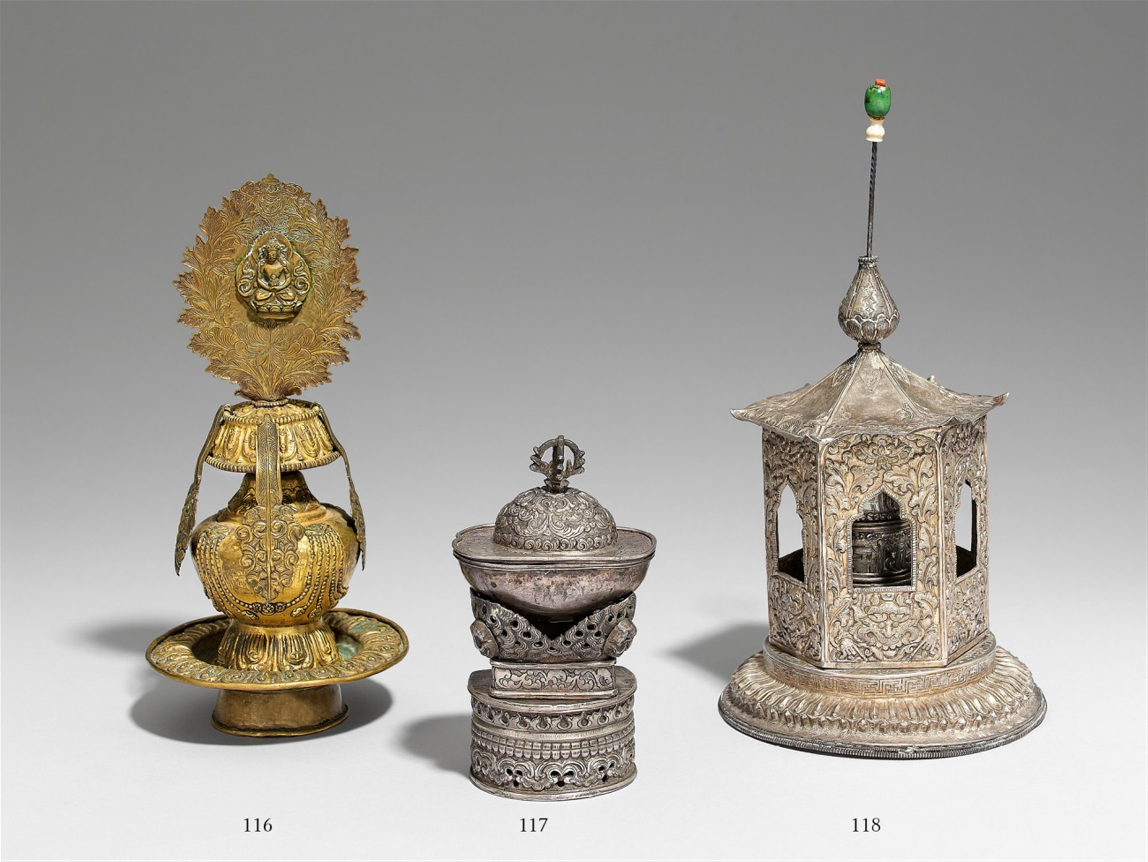 A Tibetan gilt bronze jivana-kalasa (tib. tsebum) with stand and finial - image-1