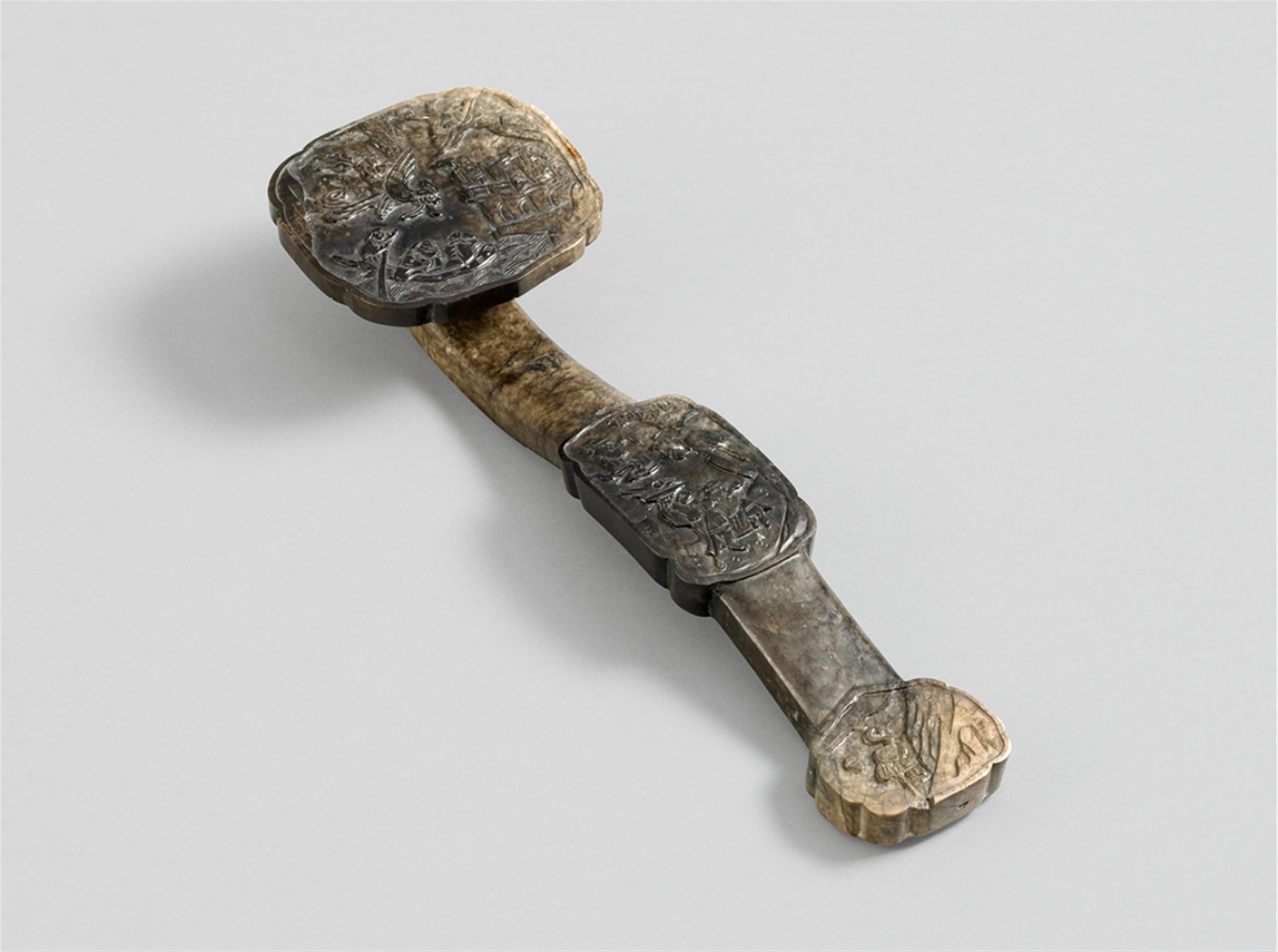 A beige-brown and black jade sceptre - image-1
