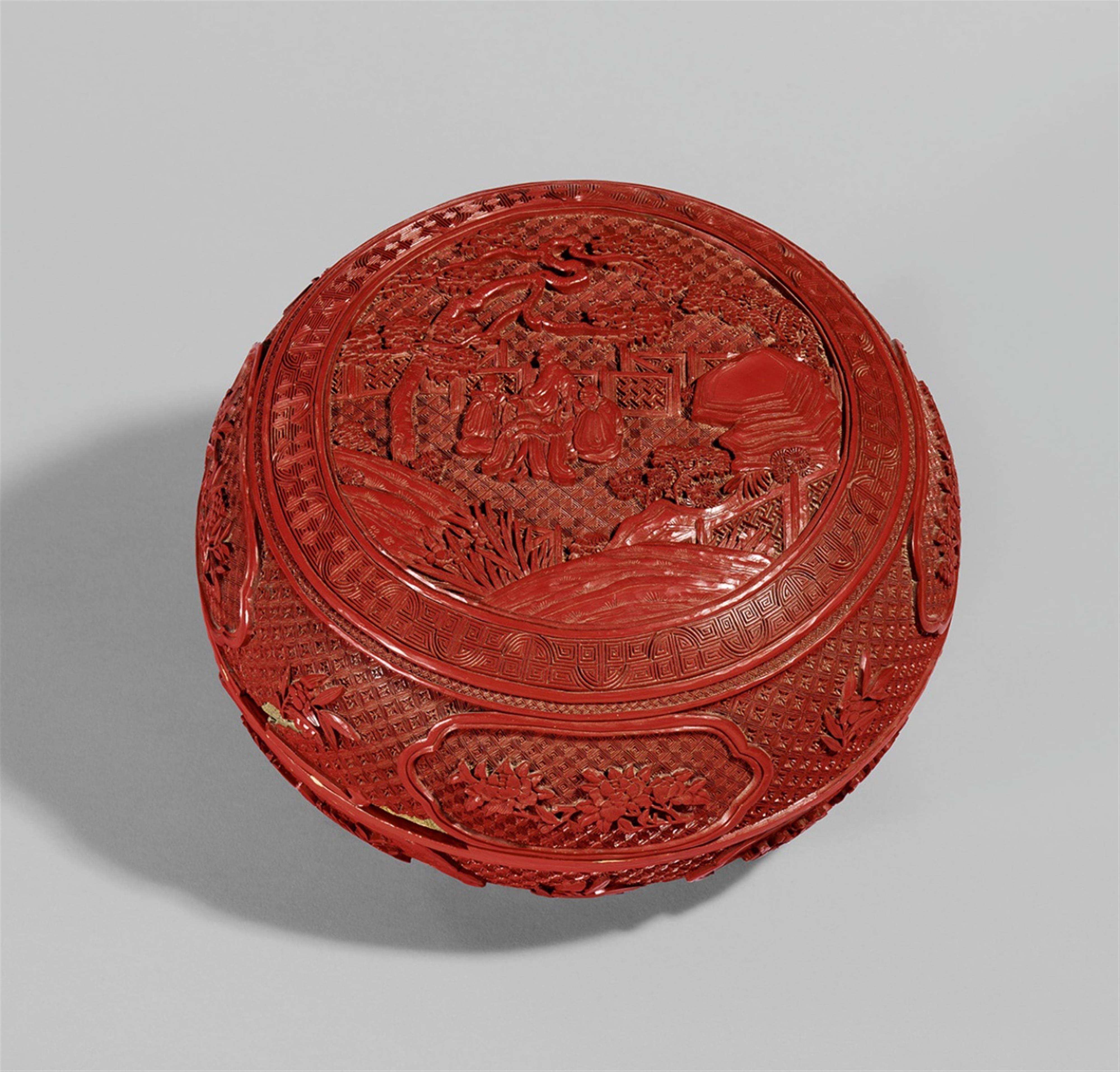 A circular carved red lacquer box and cover. 19th century - image-1