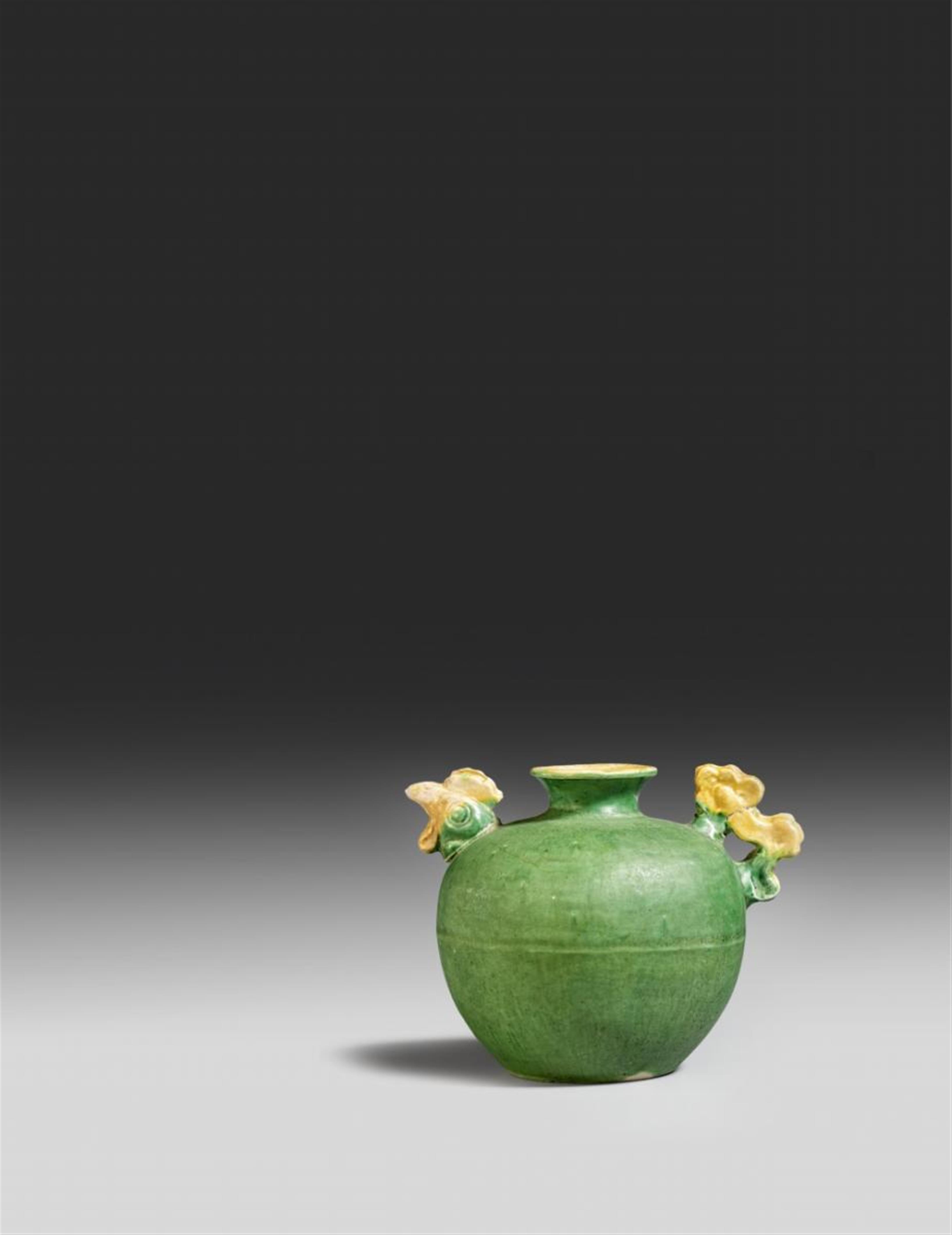 A green- and yellow-glazed chicken head jarlet. 16th century - image-1