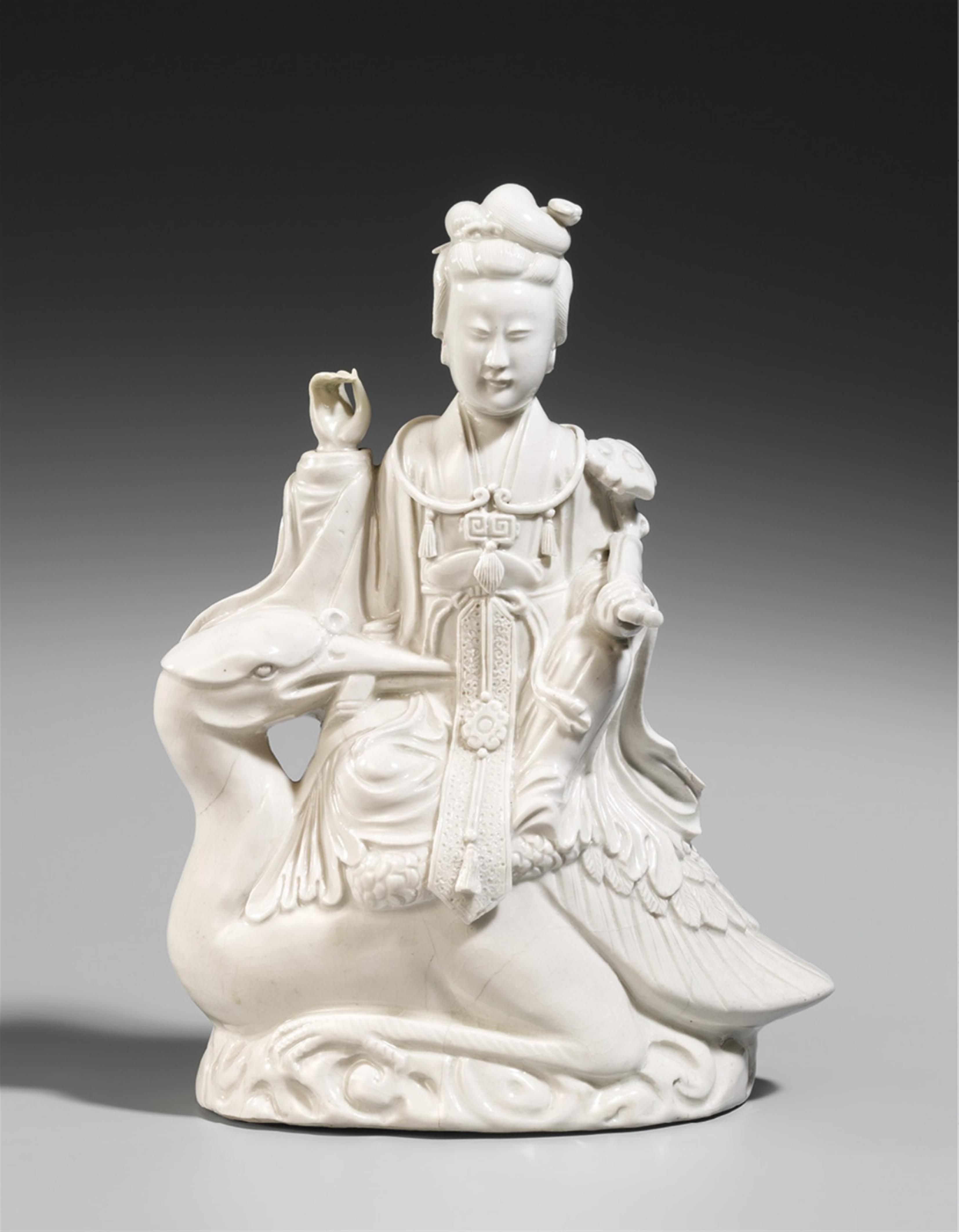 A blanc-de-Chine figure of a female deity sitting on a crane. Dehua. 20th century - image-2