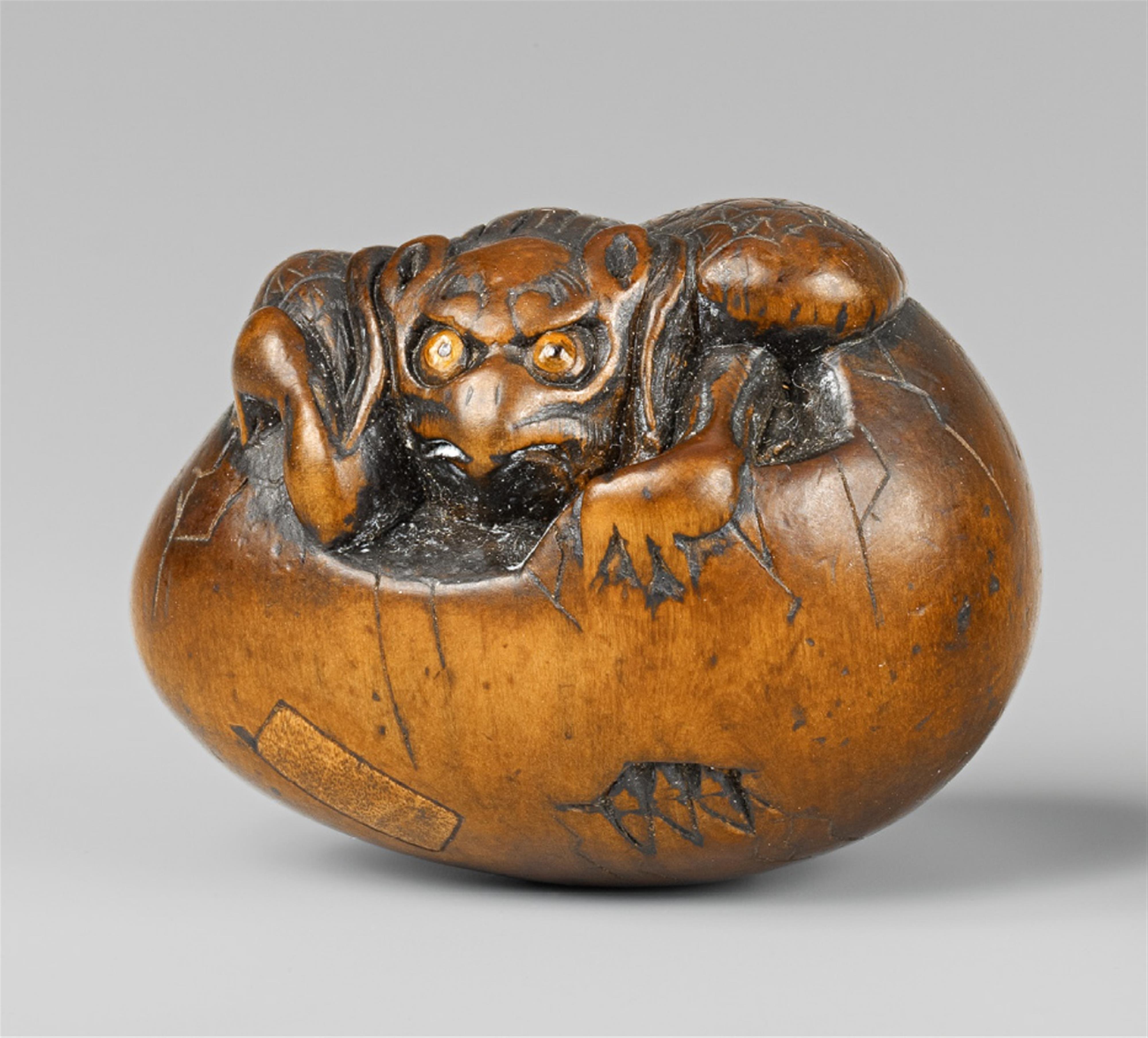 A large boxwood netsuke of a tengu no tamago. Early 19th century - image-1