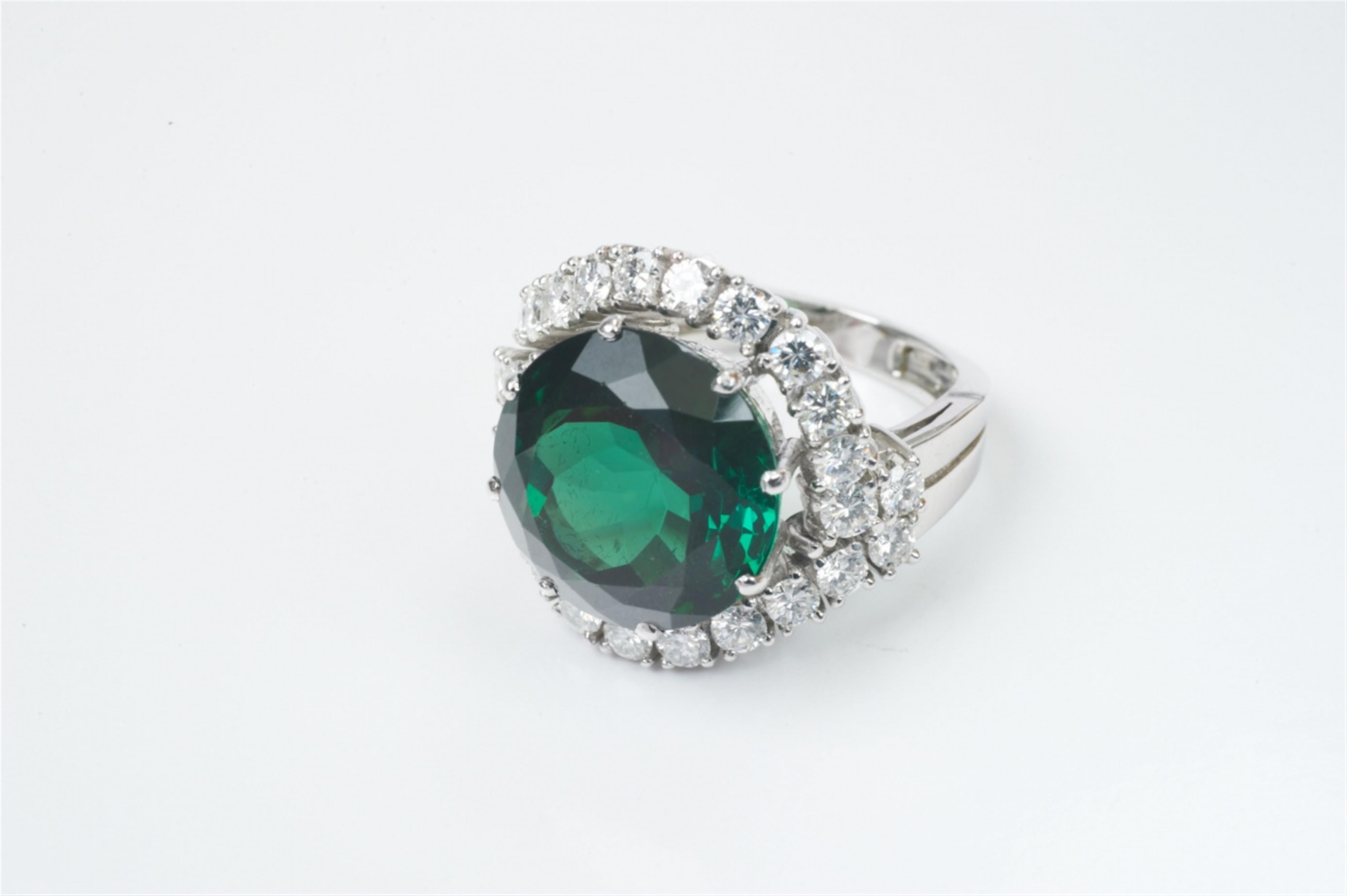 An 18k white gold, diamond and green tourmaline cocktail ring by Hans Wipperfeld - image-2