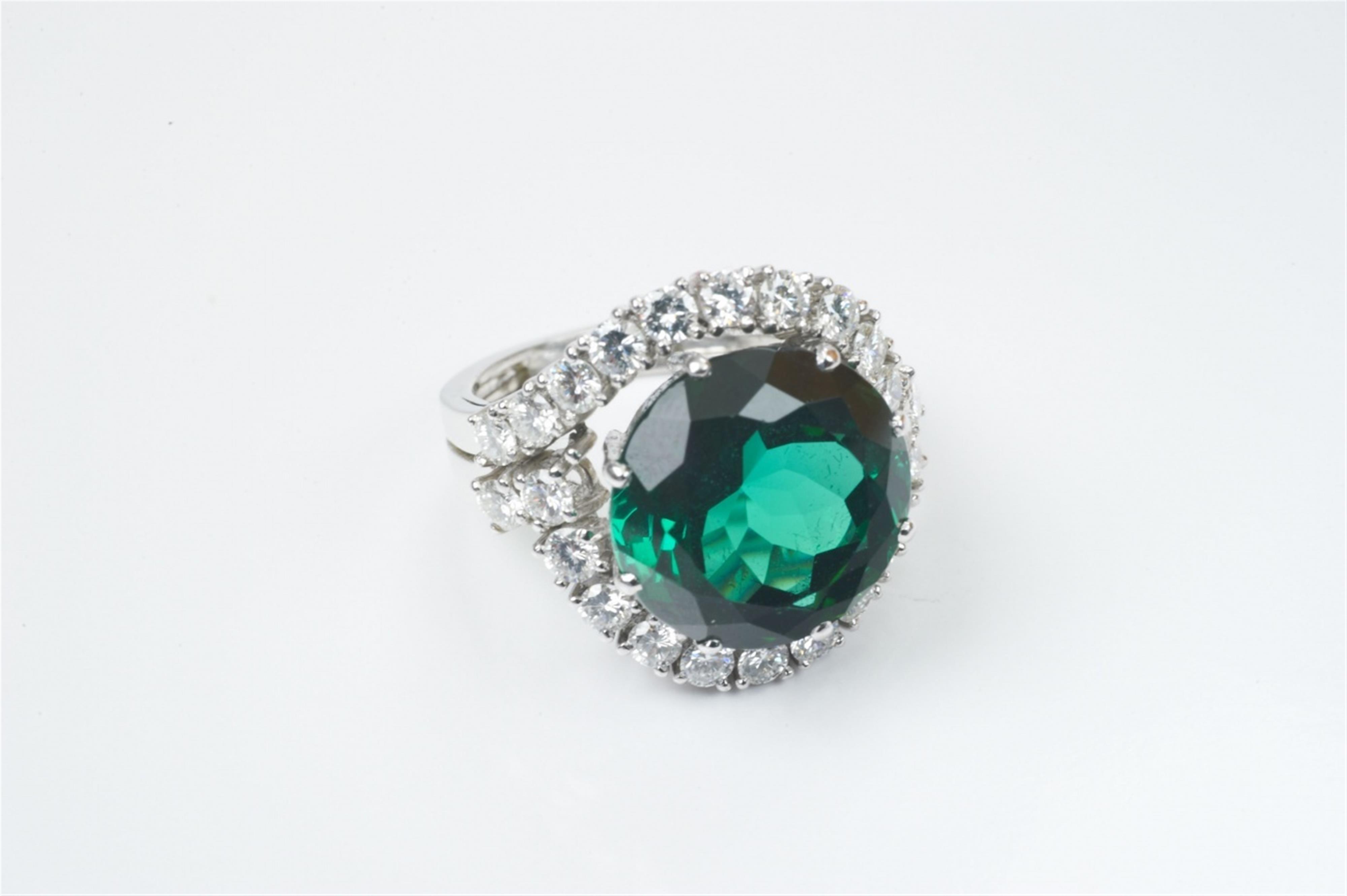 An 18k white gold, diamond and green tourmaline cocktail ring by Hans Wipperfeld - image-1