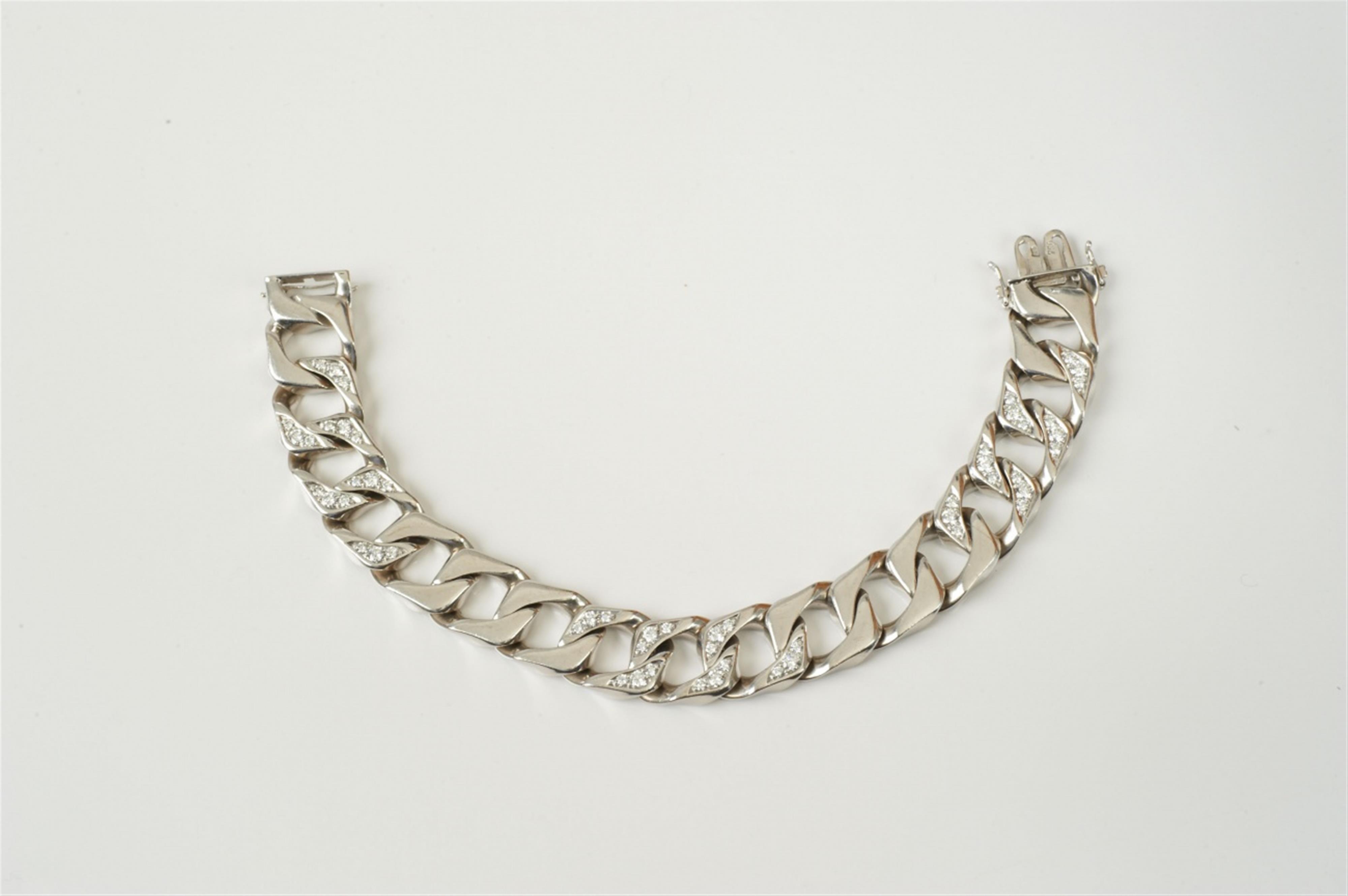 An 18k white gold and diamond link bracelet - image-1