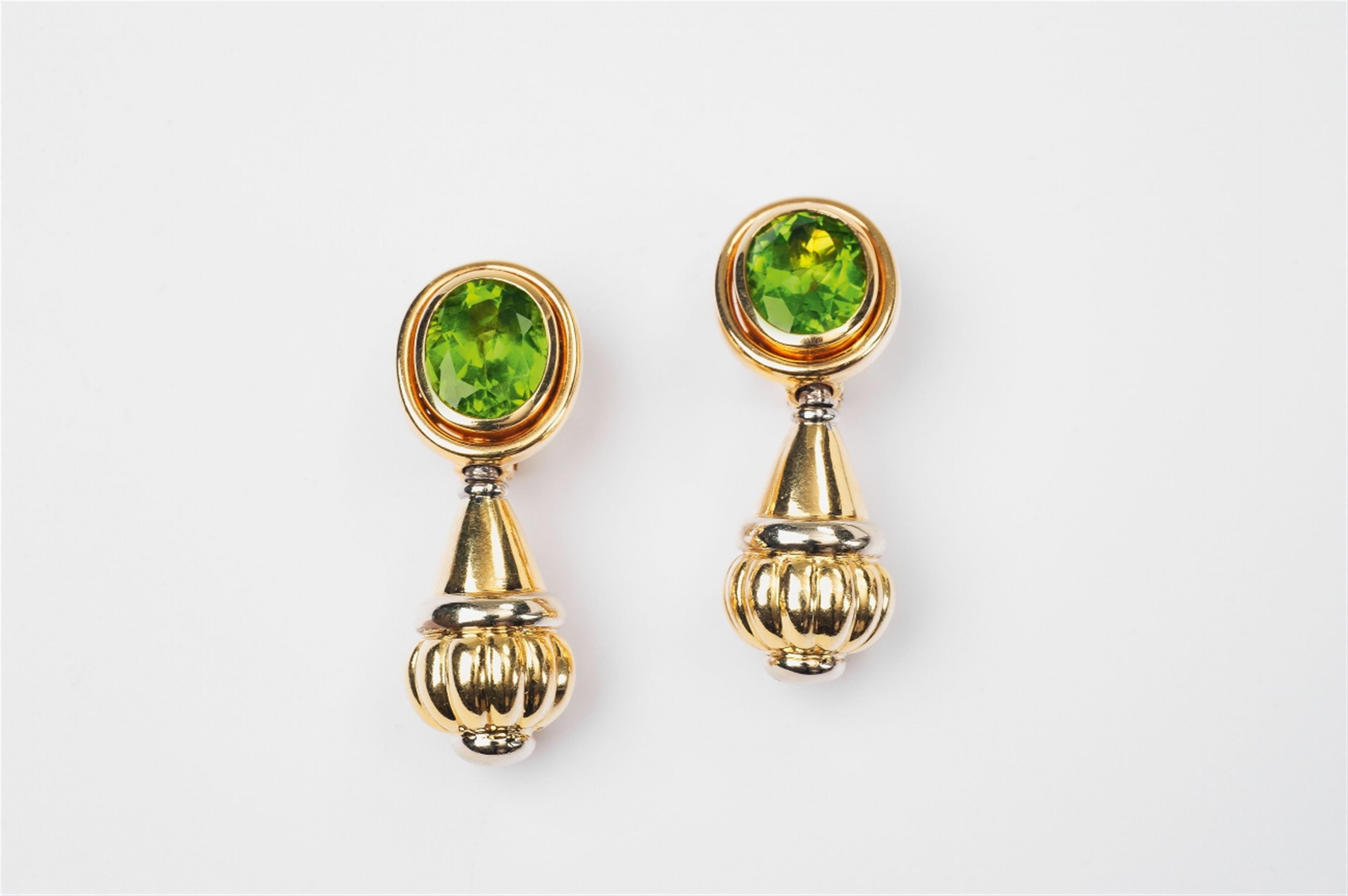 A pair of 18k bicolour gold and peridot pendant earrings by jeweller Wilm/Hamburg - image-1