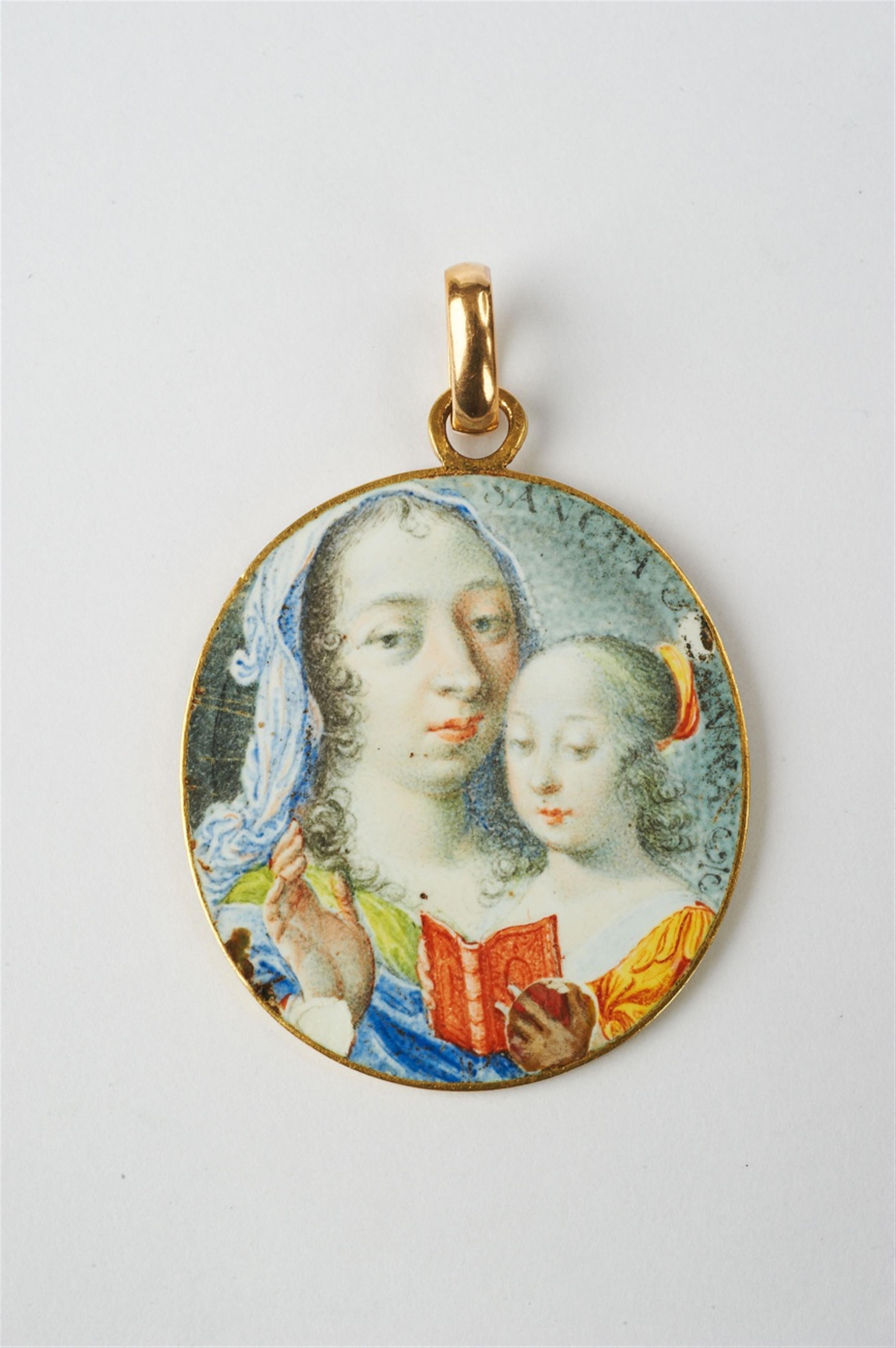 An 18k gold pendant with religious miniatures on ivory - image-3