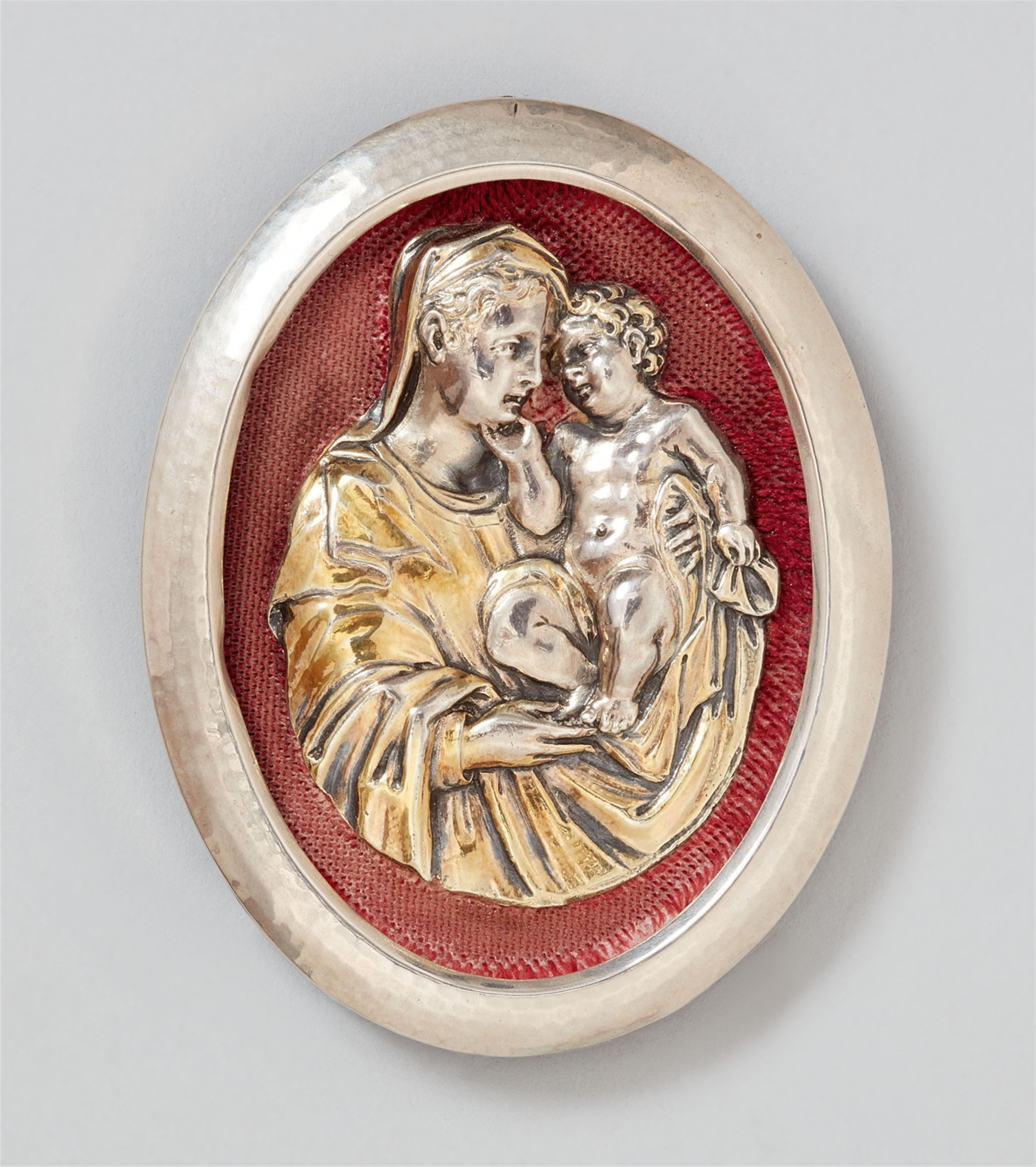 A small, partially gilt silver relief of the Virgin. Mounted on antique velvet in a modern capsule frame. Unmarked, probably South Germany, early 18th C. - image-1