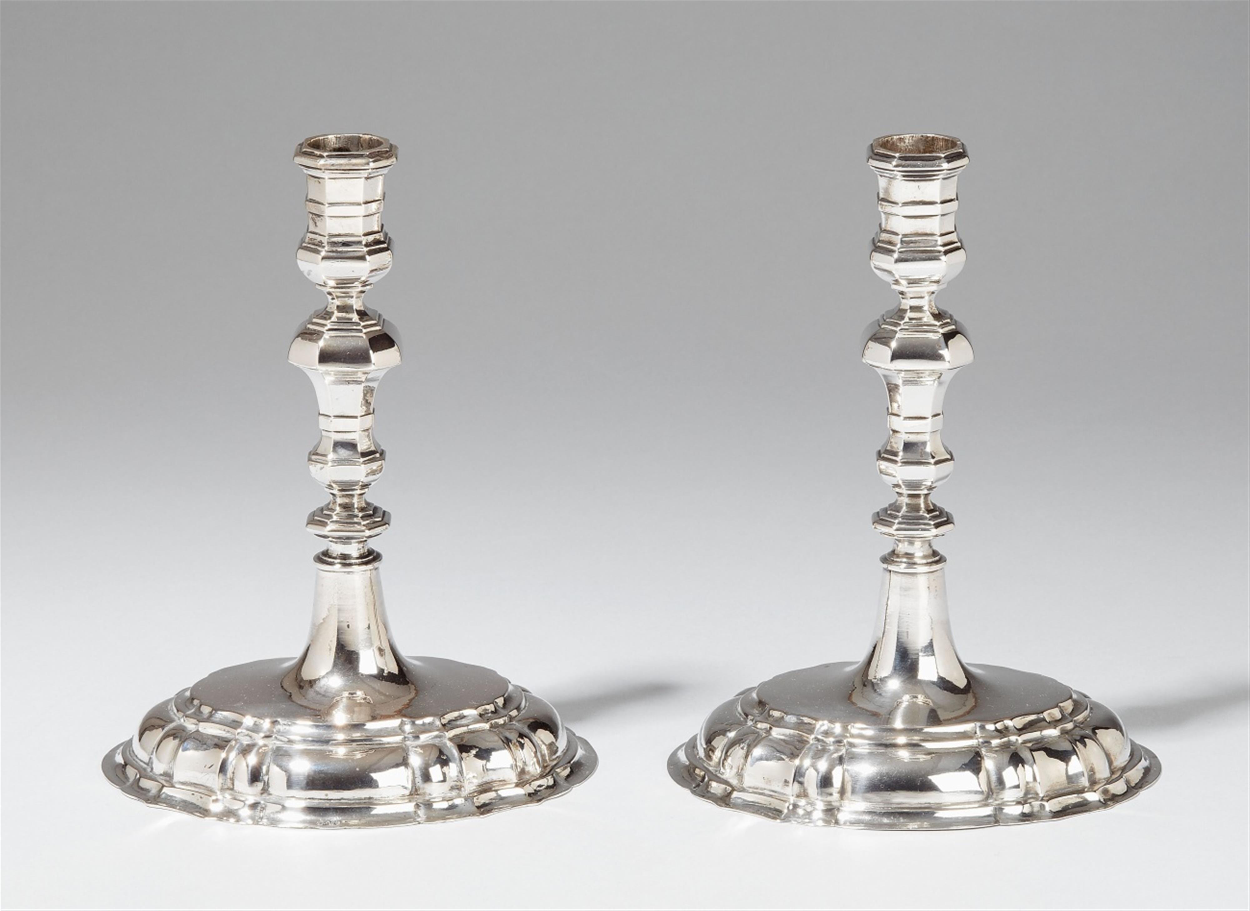 A pair of baroque Breslau silver candlesticks. Monogrammed "A.C.G.V.S." to the underside. Marks of George Kahler the Younger, 1737 - 45. - image-1