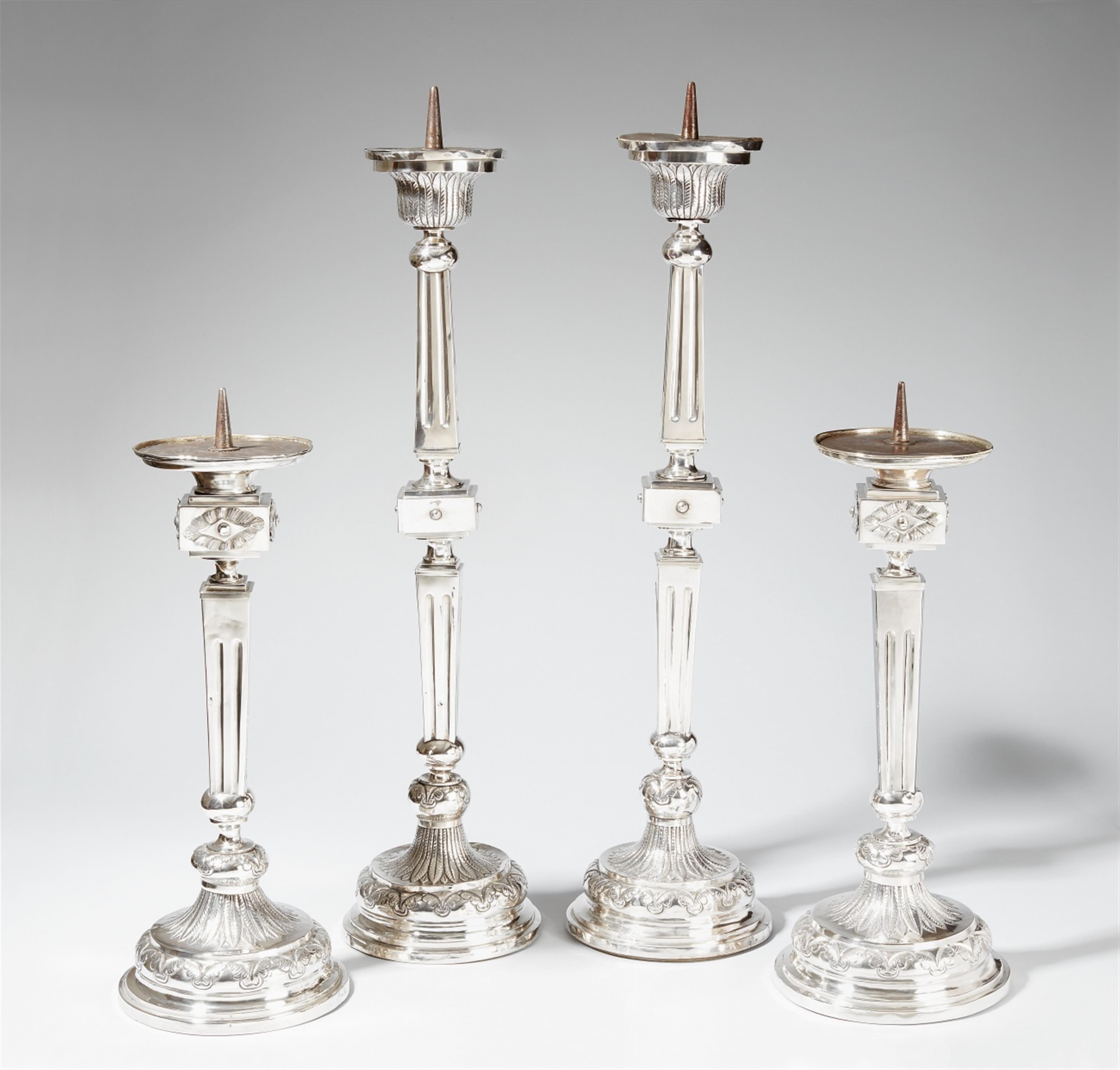 Four Düren silver altar candlesticks. With the engraved dedication "+Sub:Past:J:J:Wisdorff" to the base of the larger candlesticks, the smaller monogrammed "PJW" and dated 1823. Marks of Johann Jakob Gamaliel Reuter, ca. 1820. - image-1