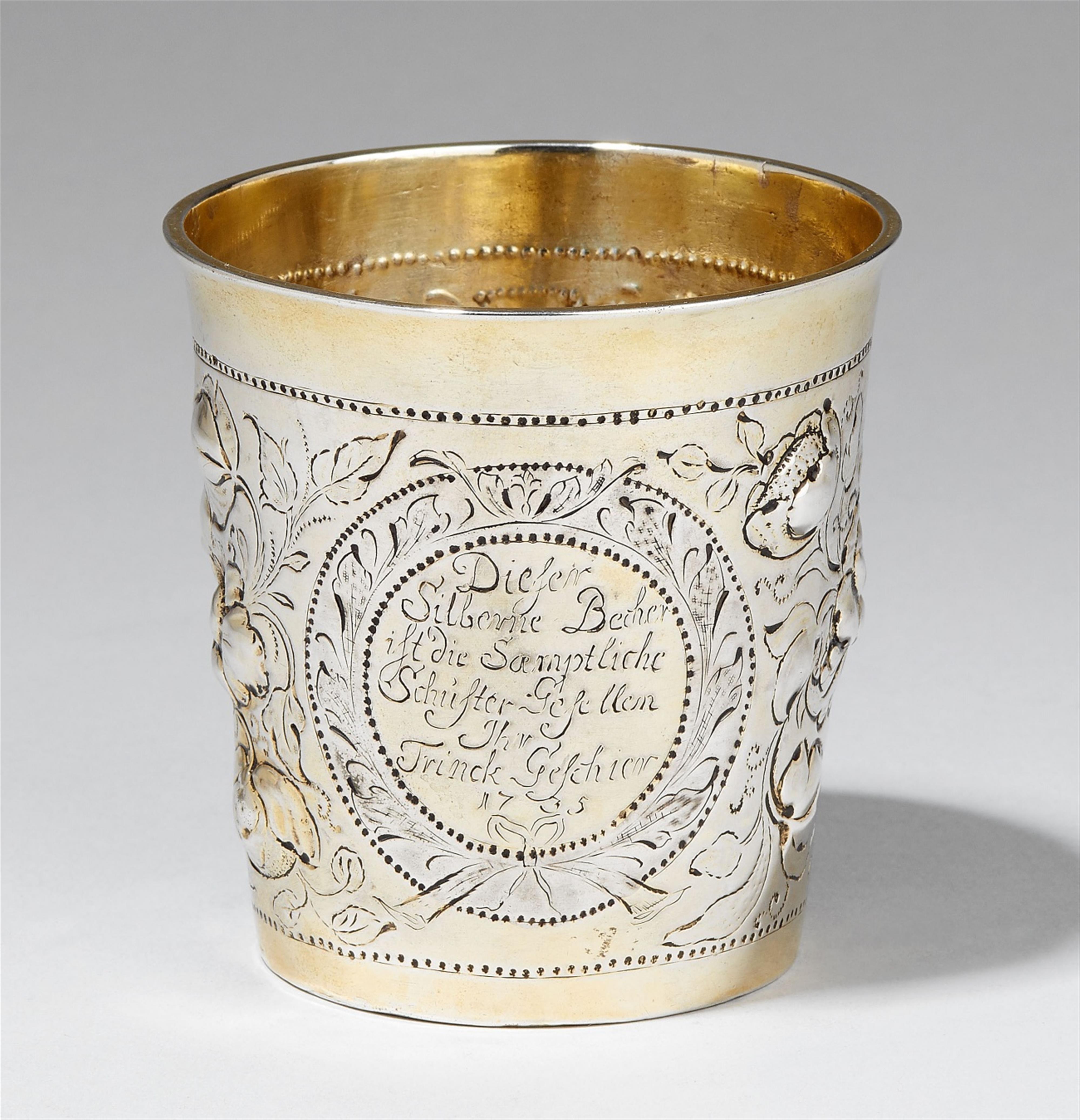 A Tondern silver gilt beaker for the shoemakers' apprentices. Engraved with the dedication "Dieser Silberne Becher ist die Samptliche Schuster-Gesellen Ihr Trinck-Geschier", dated 1735. Marks of Friedirch Christian Munck, 1735. - image-1